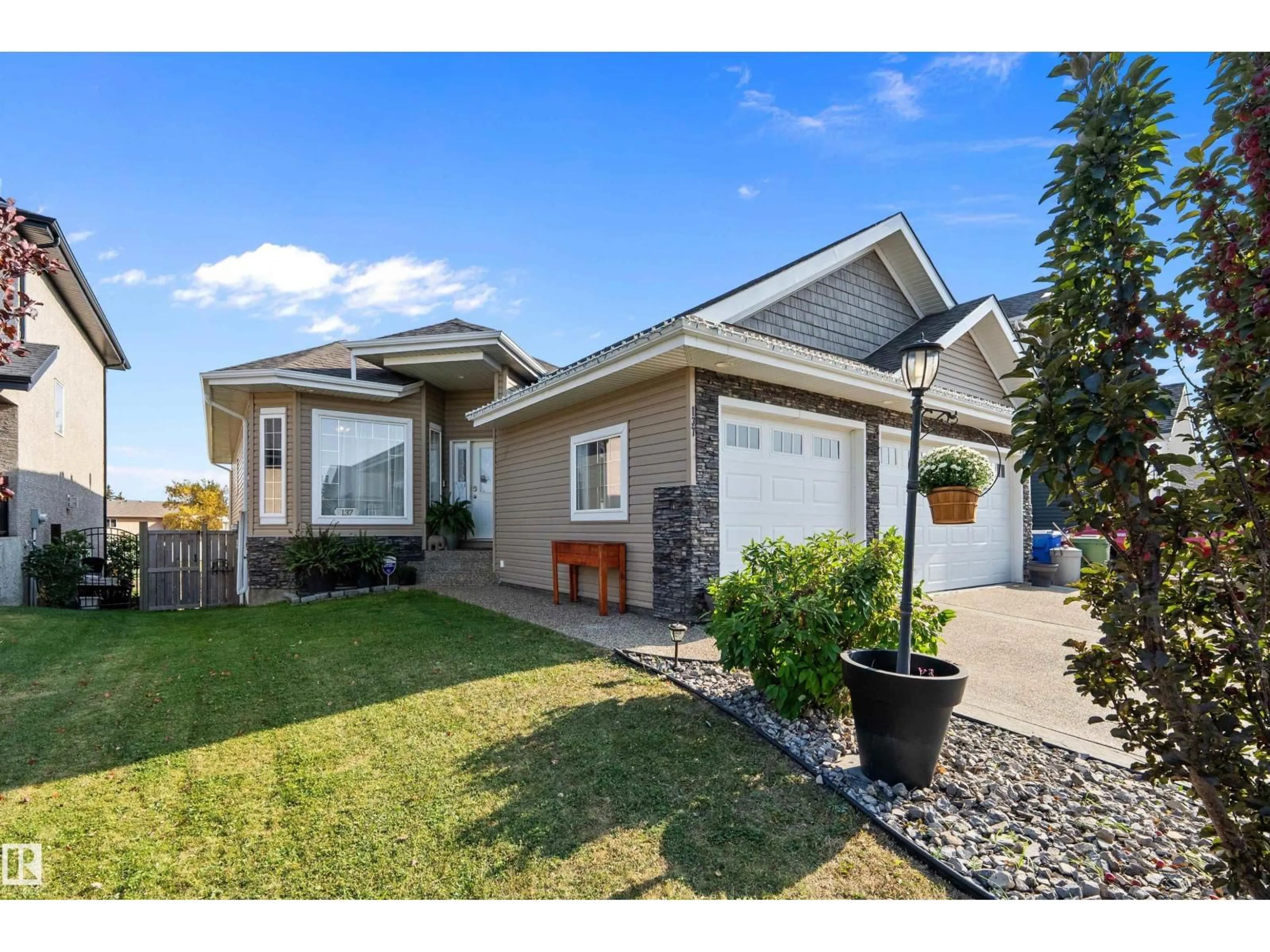 Home with vinyl exterior material, street for 137 CYPRESS DR, Wetaskiwin Alberta T9A1K6