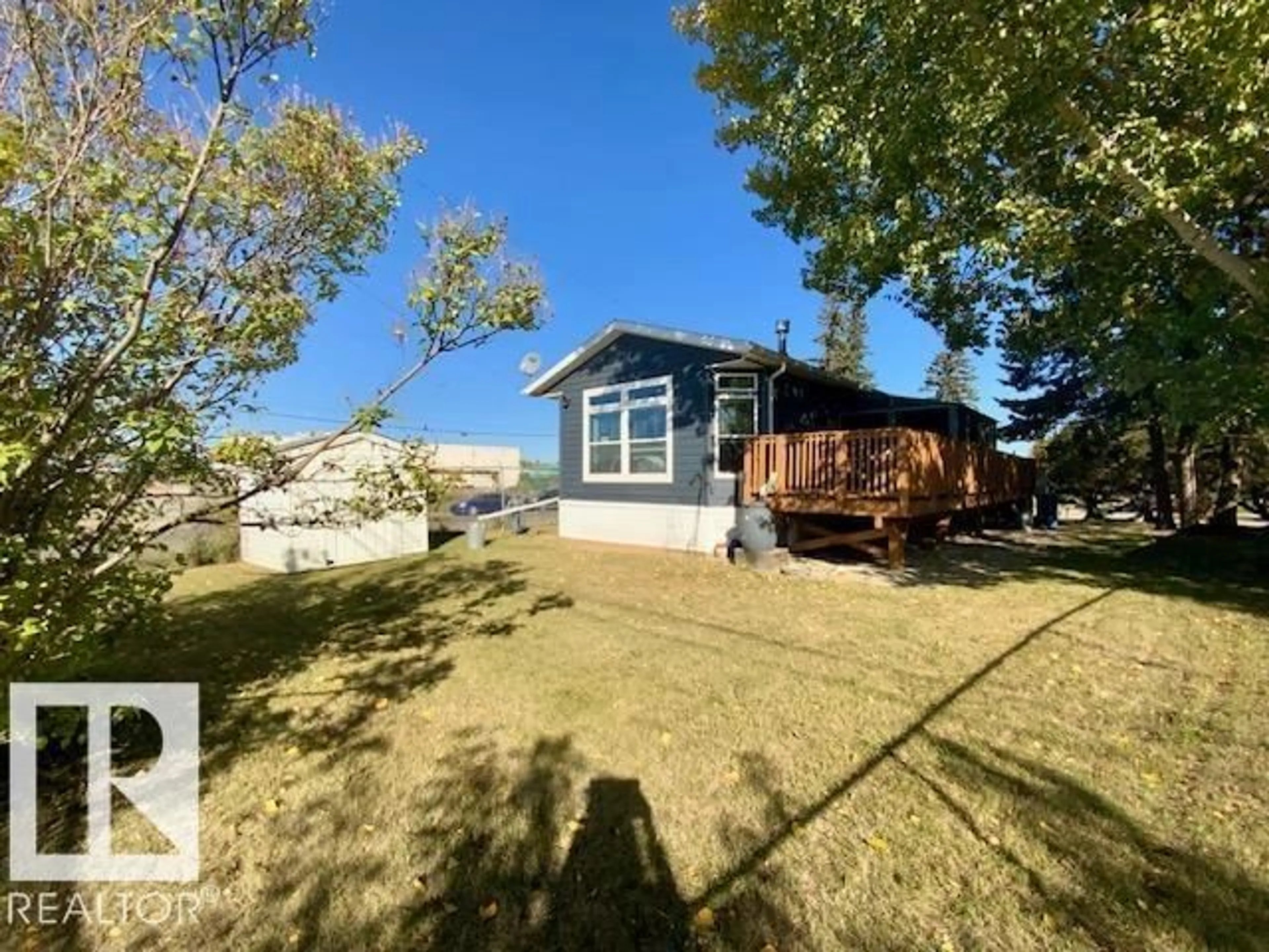 A pic from outside/outdoor area/front of a property/back of a property/a pic from drone, water/lake/river/ocean view for 61 - 4204 47 ST, Wetaskiwin Alberta T9A2H5