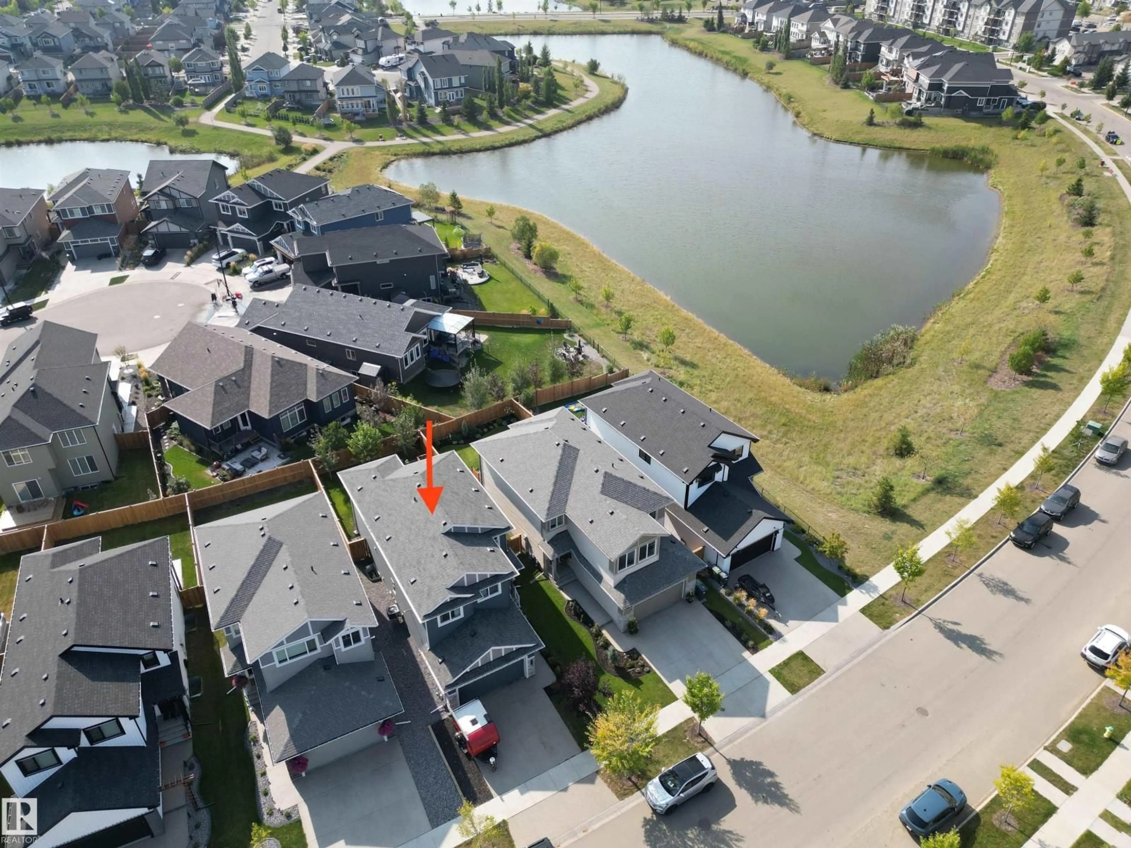 A pic from outside/outdoor area/front of a property/back of a property/a pic from drone, water/lake/river/ocean view for 141 DANSEREAU WY, Beaumont Alberta T4X2Y5