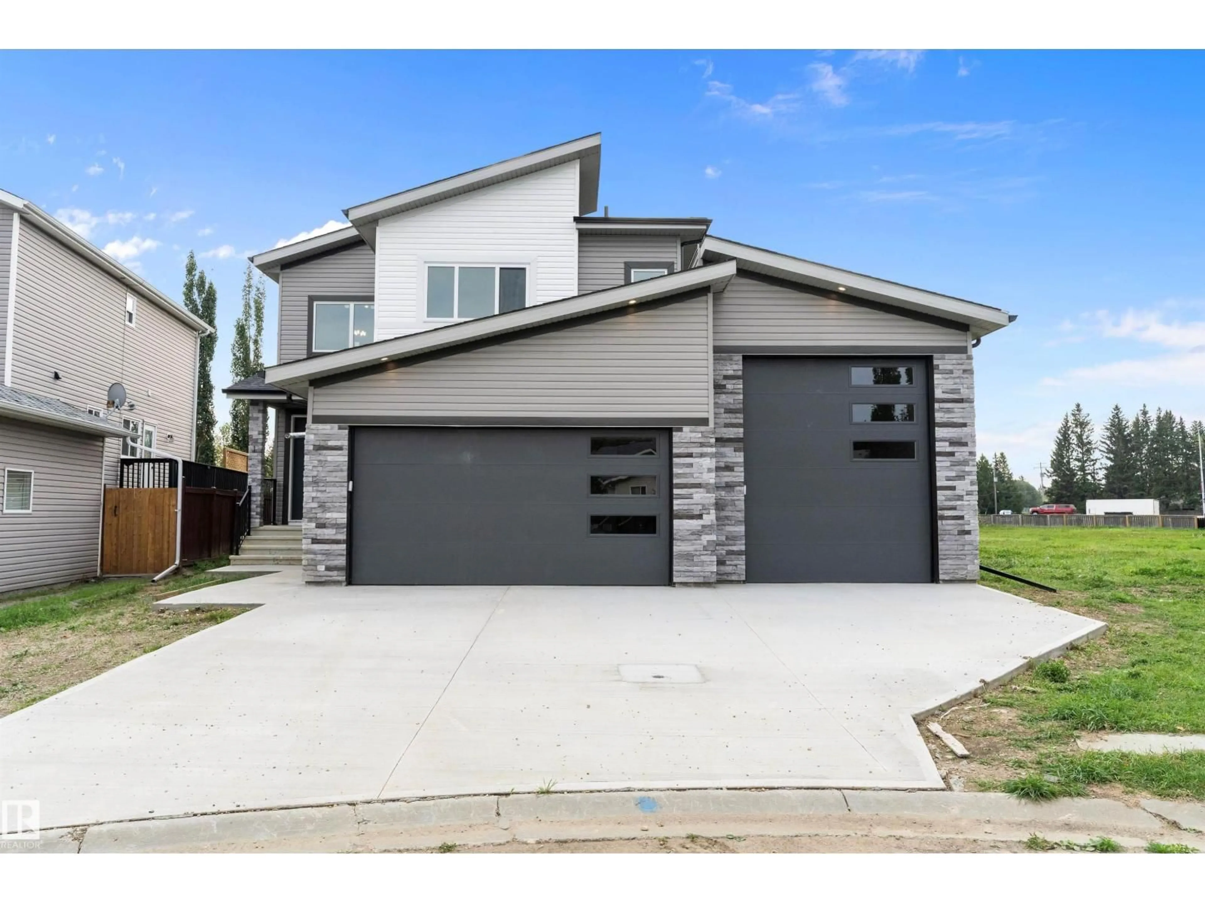 Home with brick exterior material, street for 1 EVERGREEN CR, Calmar Alberta T0C0V0