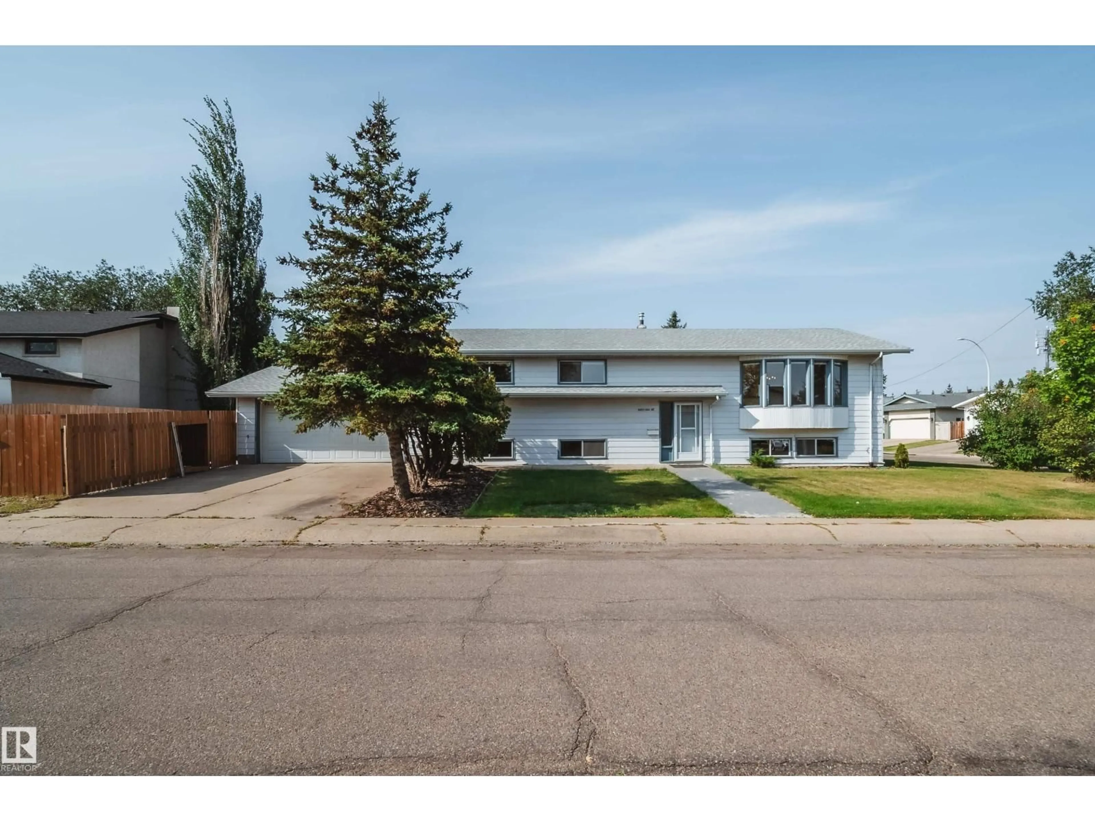 Home with vinyl exterior material, street for 18851 99A AV NW, Edmonton Alberta T5T3M9