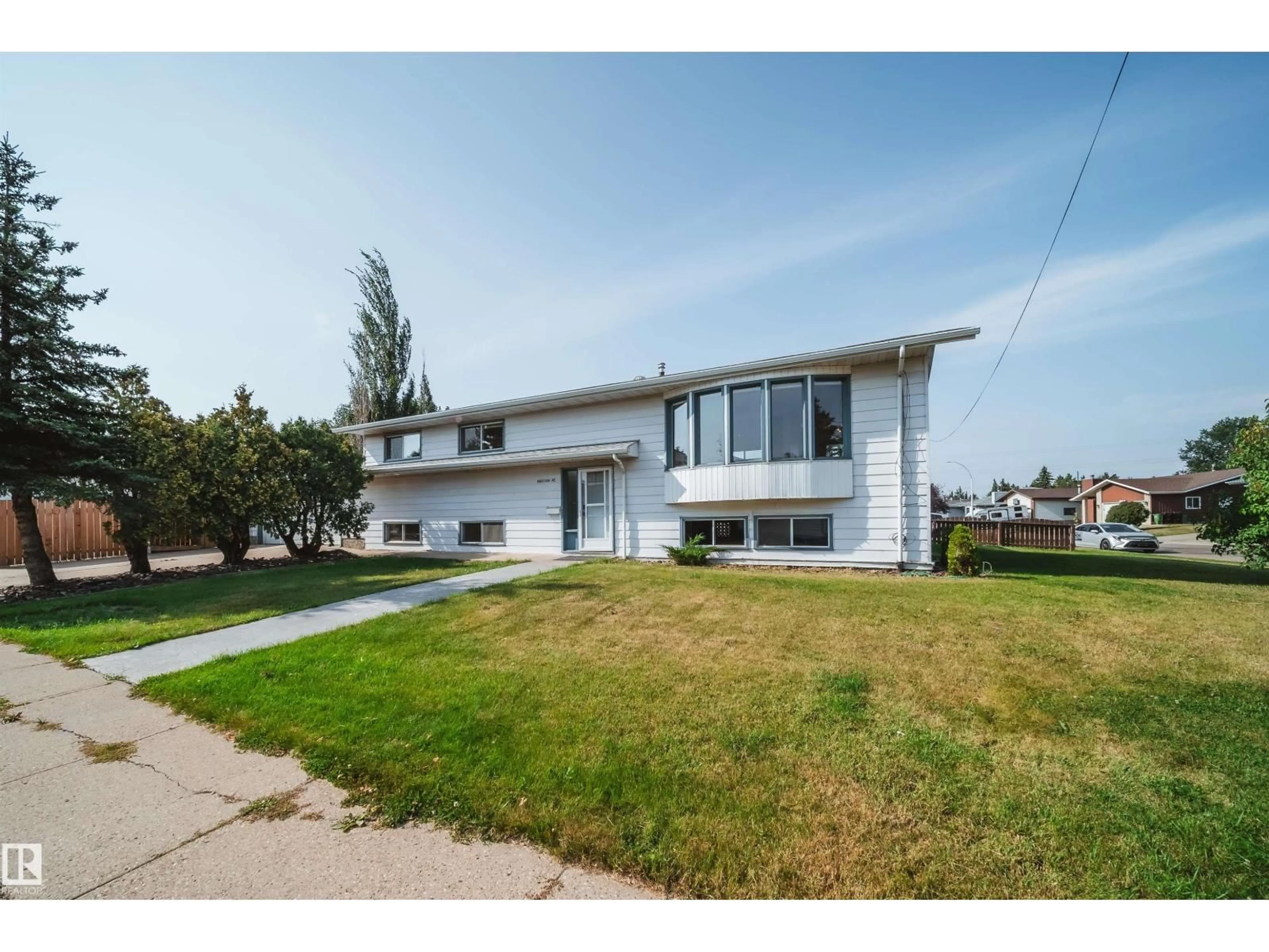 Home with vinyl exterior material, street for 18851 99A AV NW, Edmonton Alberta T5T3M9
