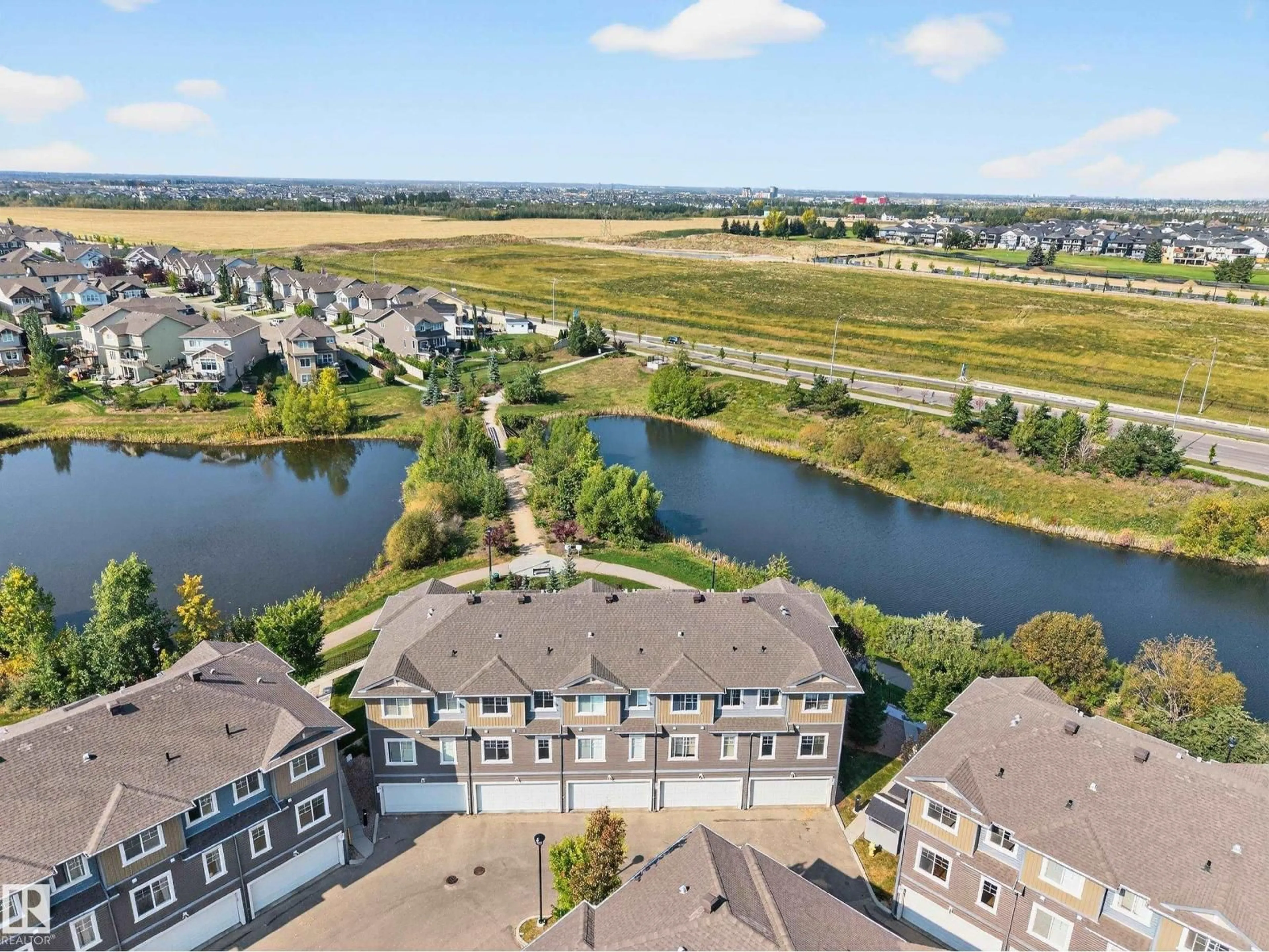 A pic from outside/outdoor area/front of a property/back of a property/a pic from drone, water/lake/river/ocean view for SW - 36 1030 CHAPPELLE BV, Edmonton Alberta T6W2K7
