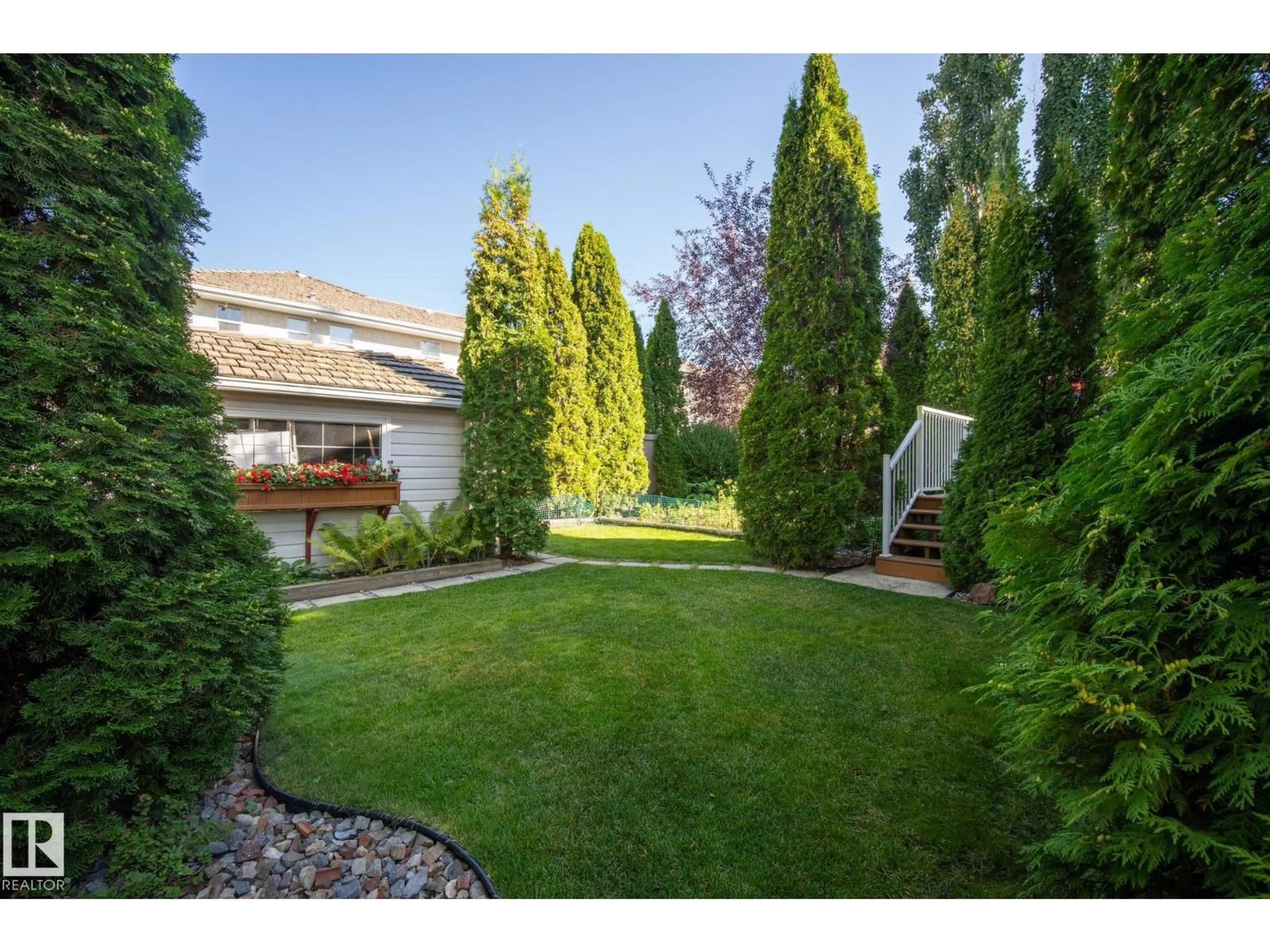 A pic from outside/outdoor area/front of a property/back of a property/a pic from drone, street for 11570 13 AV, Edmonton Alberta T6J7B3