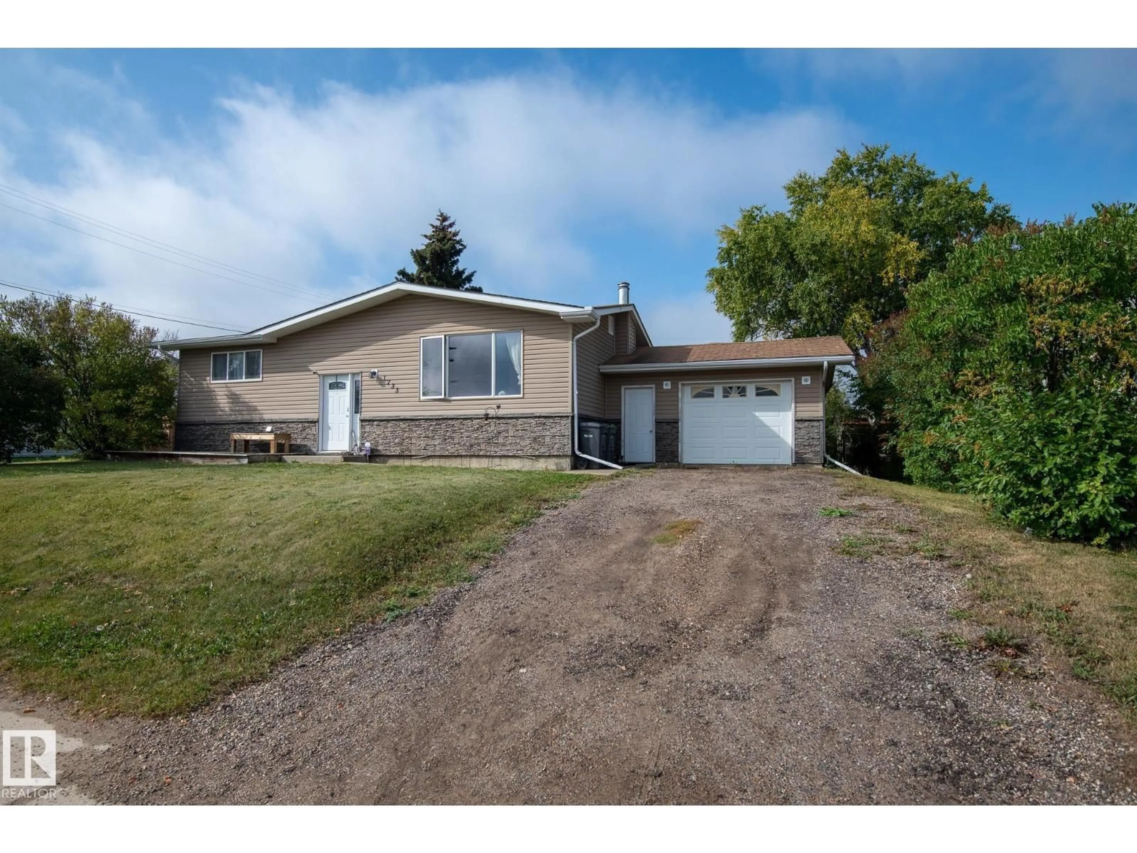 A pic from outside/outdoor area/front of a property/back of a property/a pic from drone, street for 1733 6 ST, Cold Lake Alberta T9M1L5