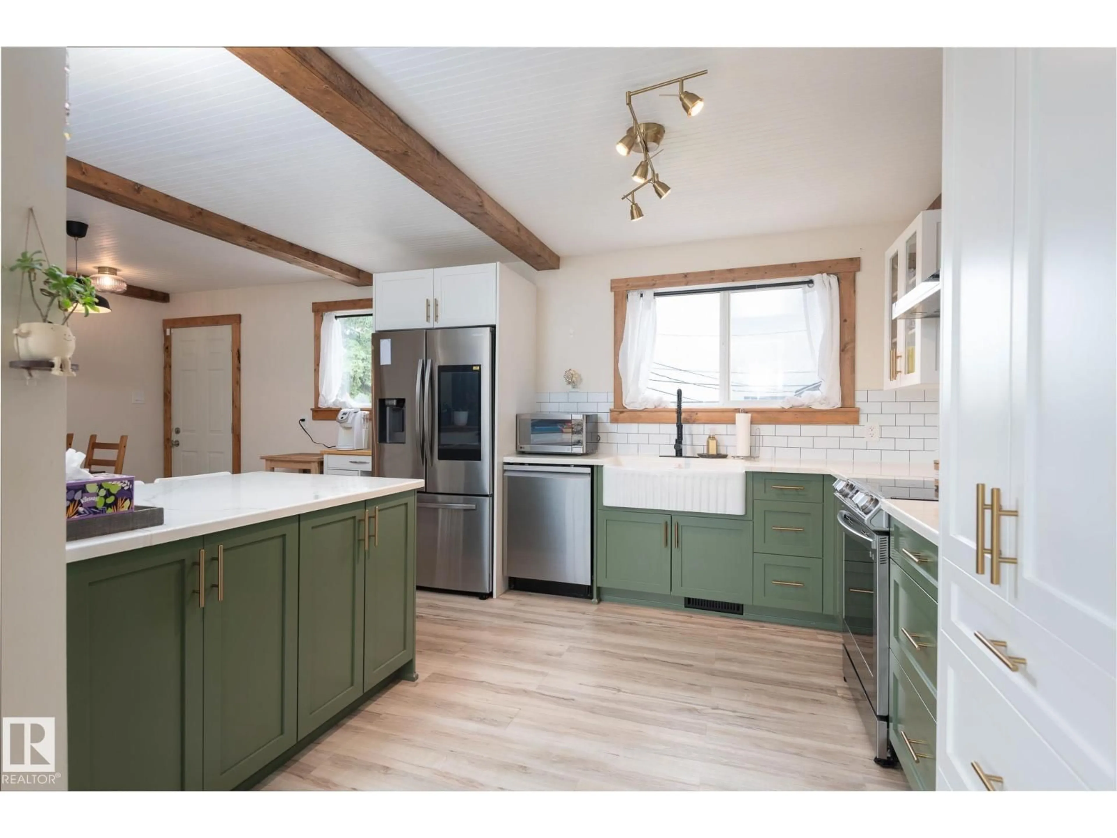 Open concept kitchen, wood/laminate floor for 1733 6 ST, Cold Lake Alberta T9M1L5