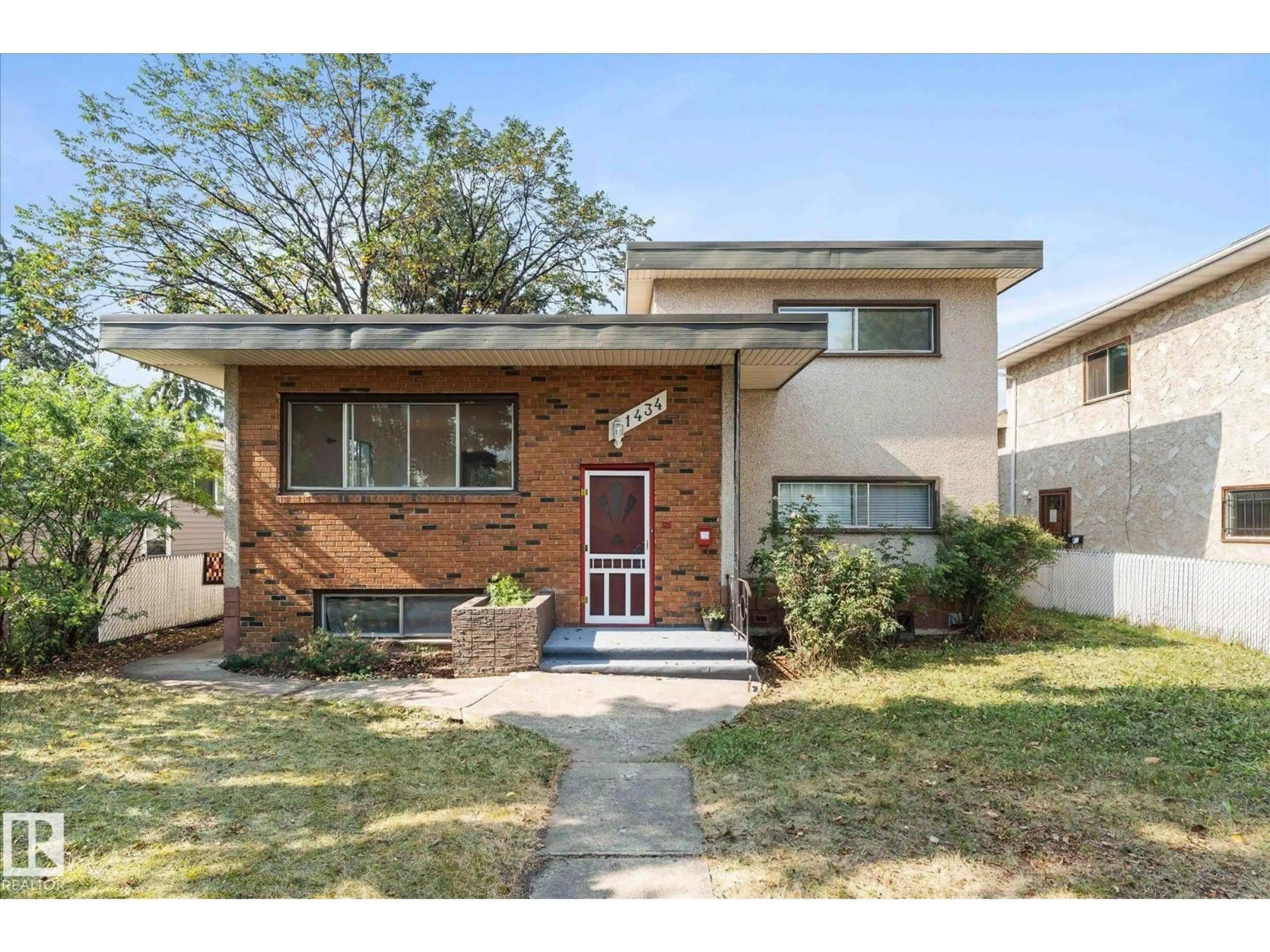 Home with brick exterior material, street for 11434 125 ST, Edmonton Alberta T5M0M9