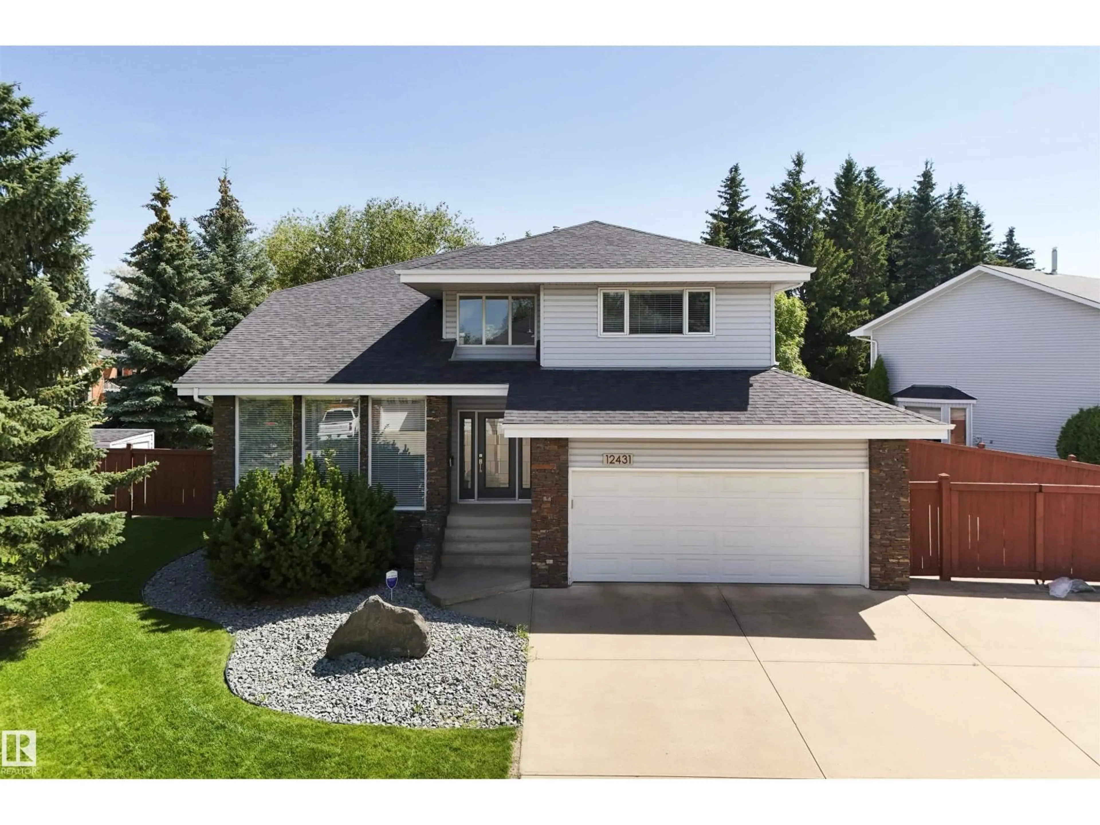 Home with vinyl exterior material, street for 12431 29A AV, Edmonton Alberta T6J6C8