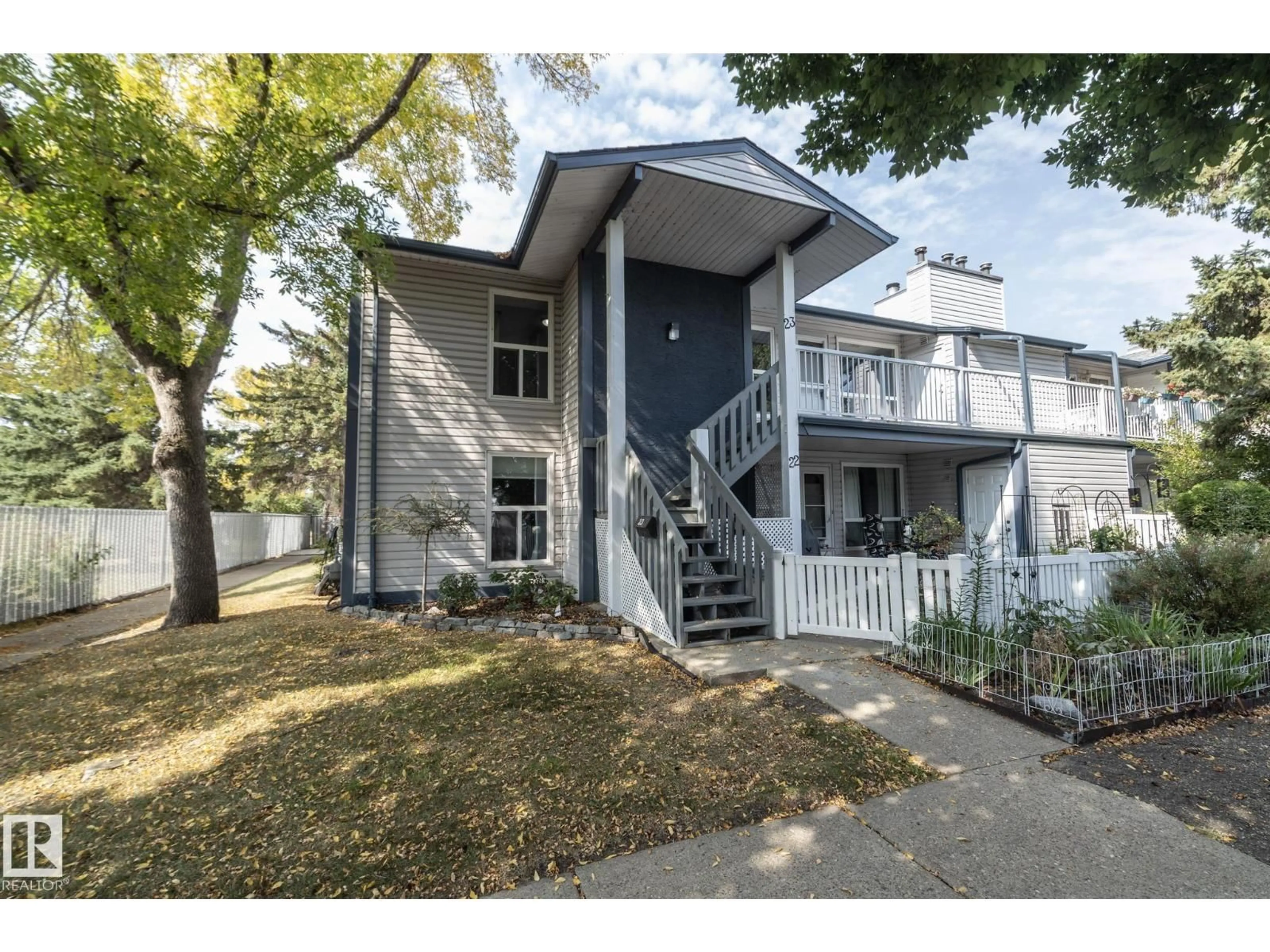 Home with vinyl exterior material, street for #23 - 14620 26 ST, Edmonton Alberta T5Y2J9