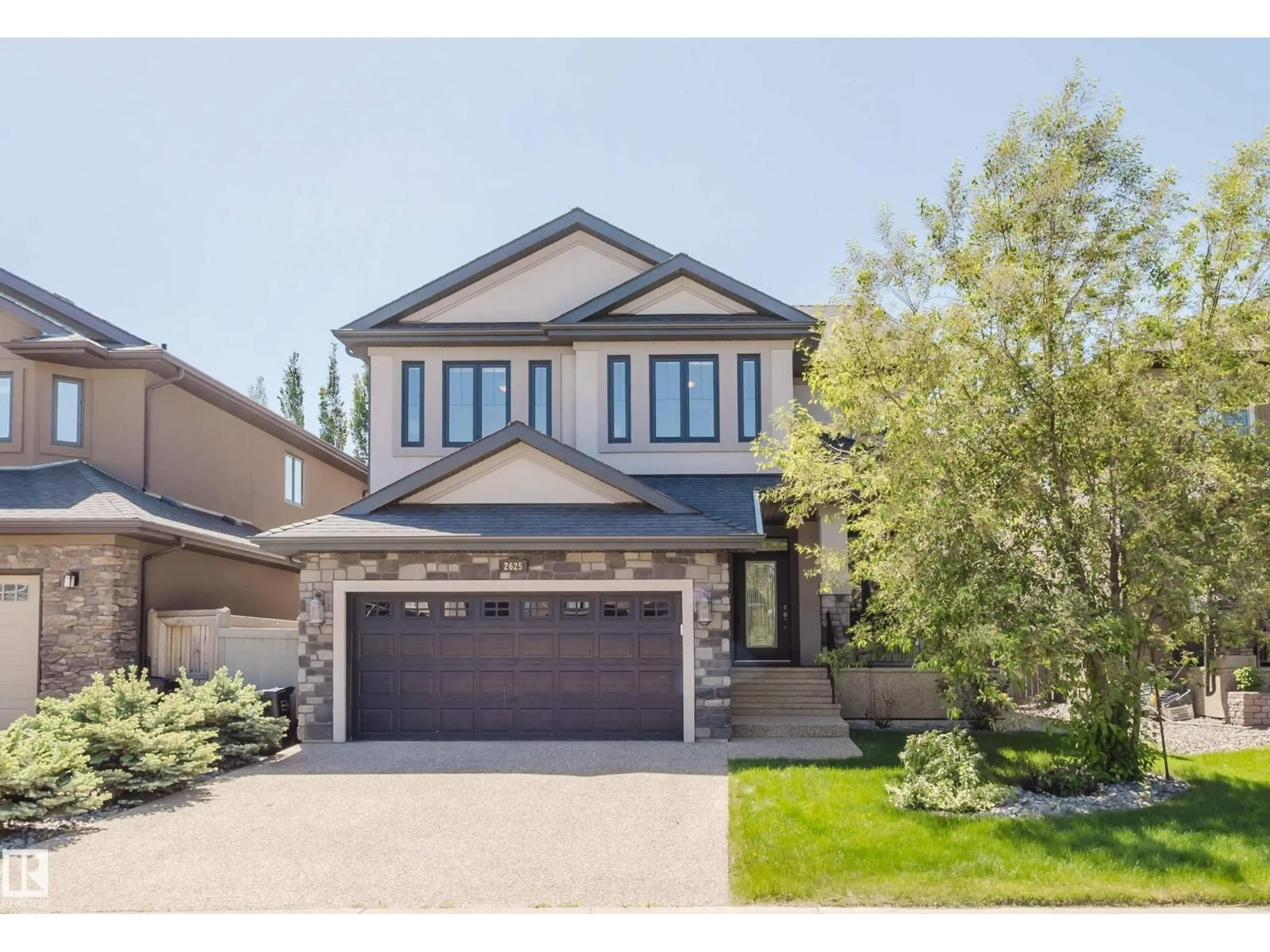 Home with vinyl exterior material, street for 2625 WATCHER WY, Edmonton Alberta T6W0X7