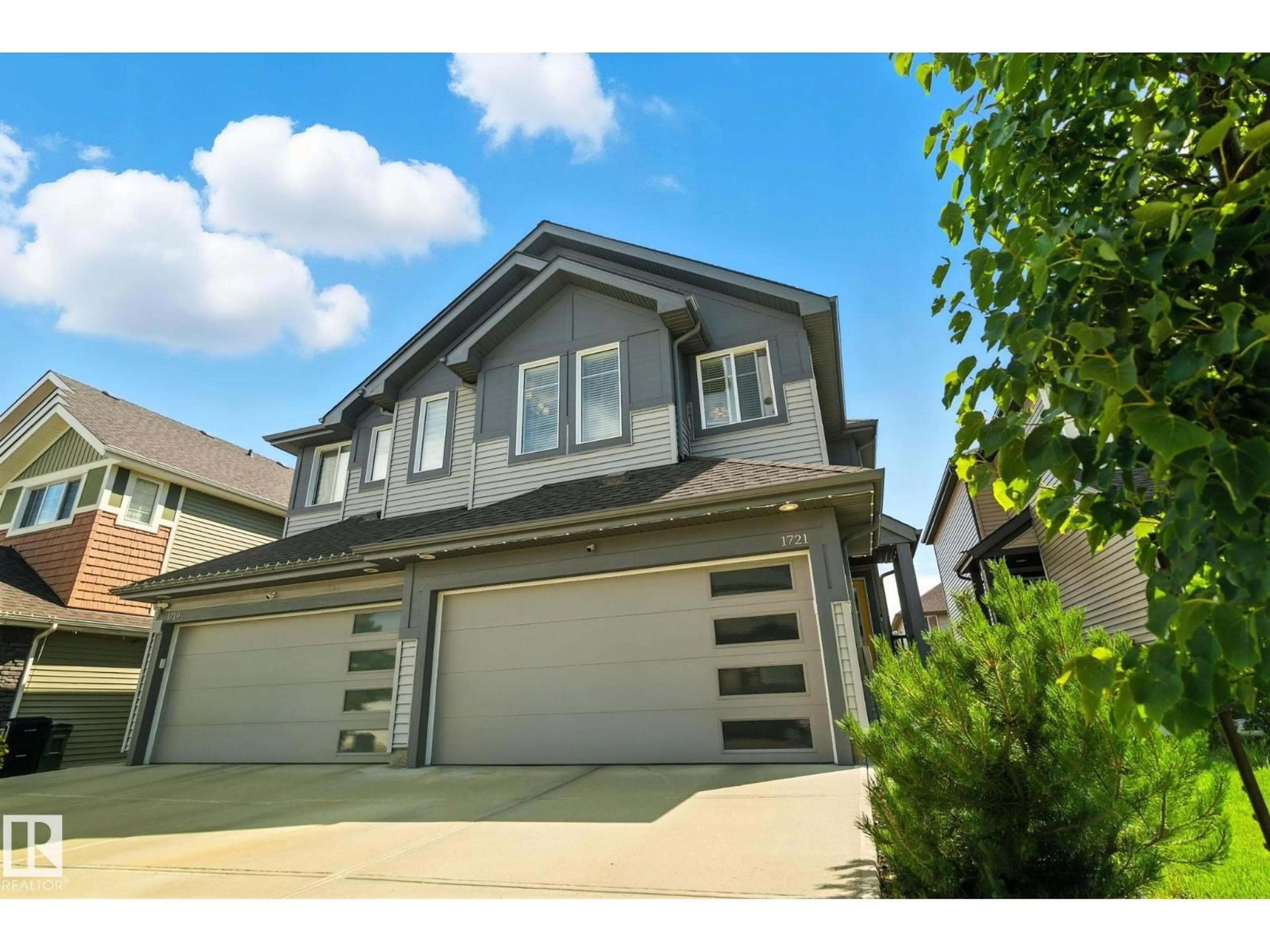 Home with vinyl exterior material, street for 1721 DUMONT CR, Edmonton Alberta T6W3J2