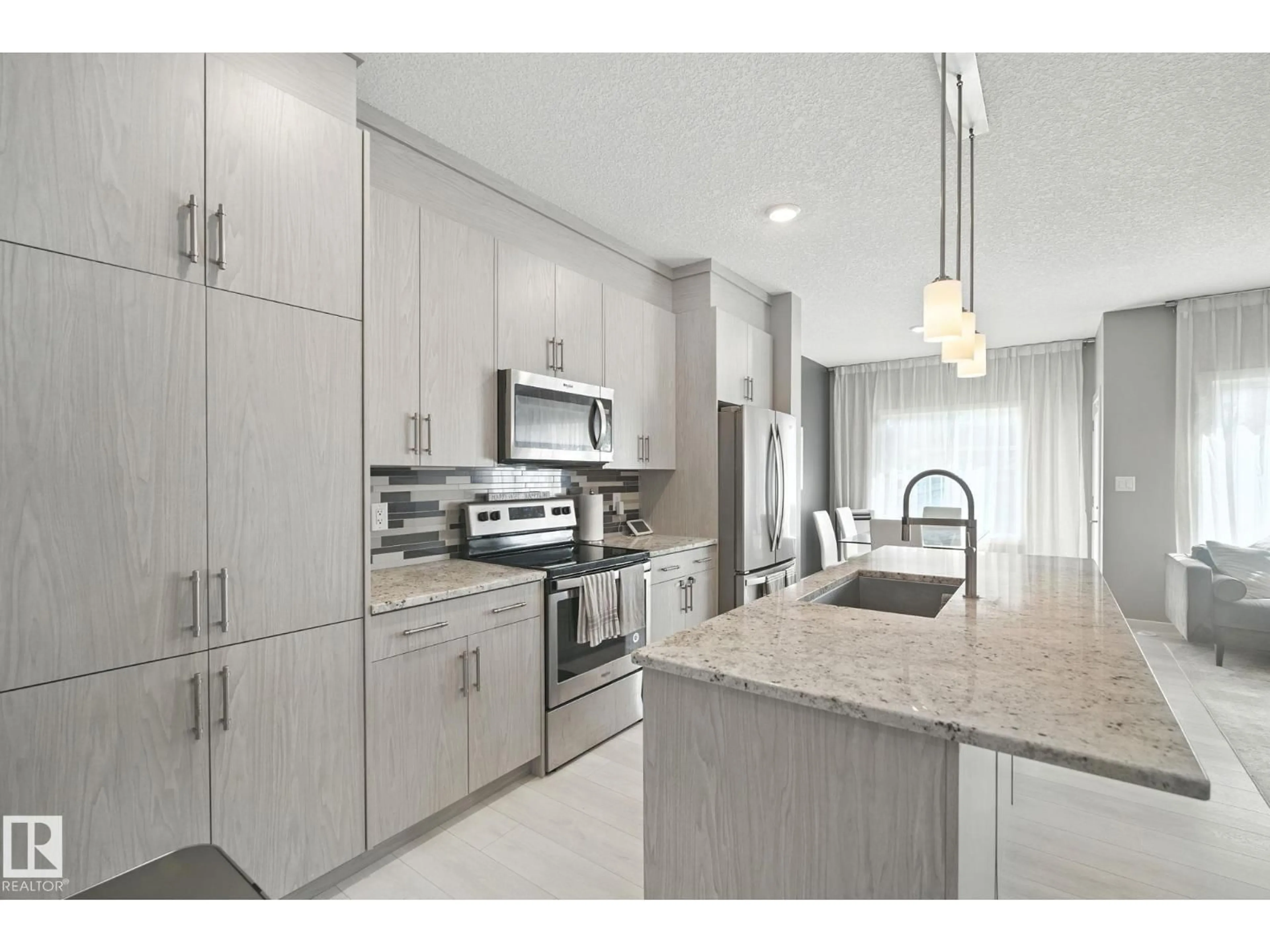 Open concept kitchen, ceramic/tile floor for 1721 DUMONT CR, Edmonton Alberta T6W3J2