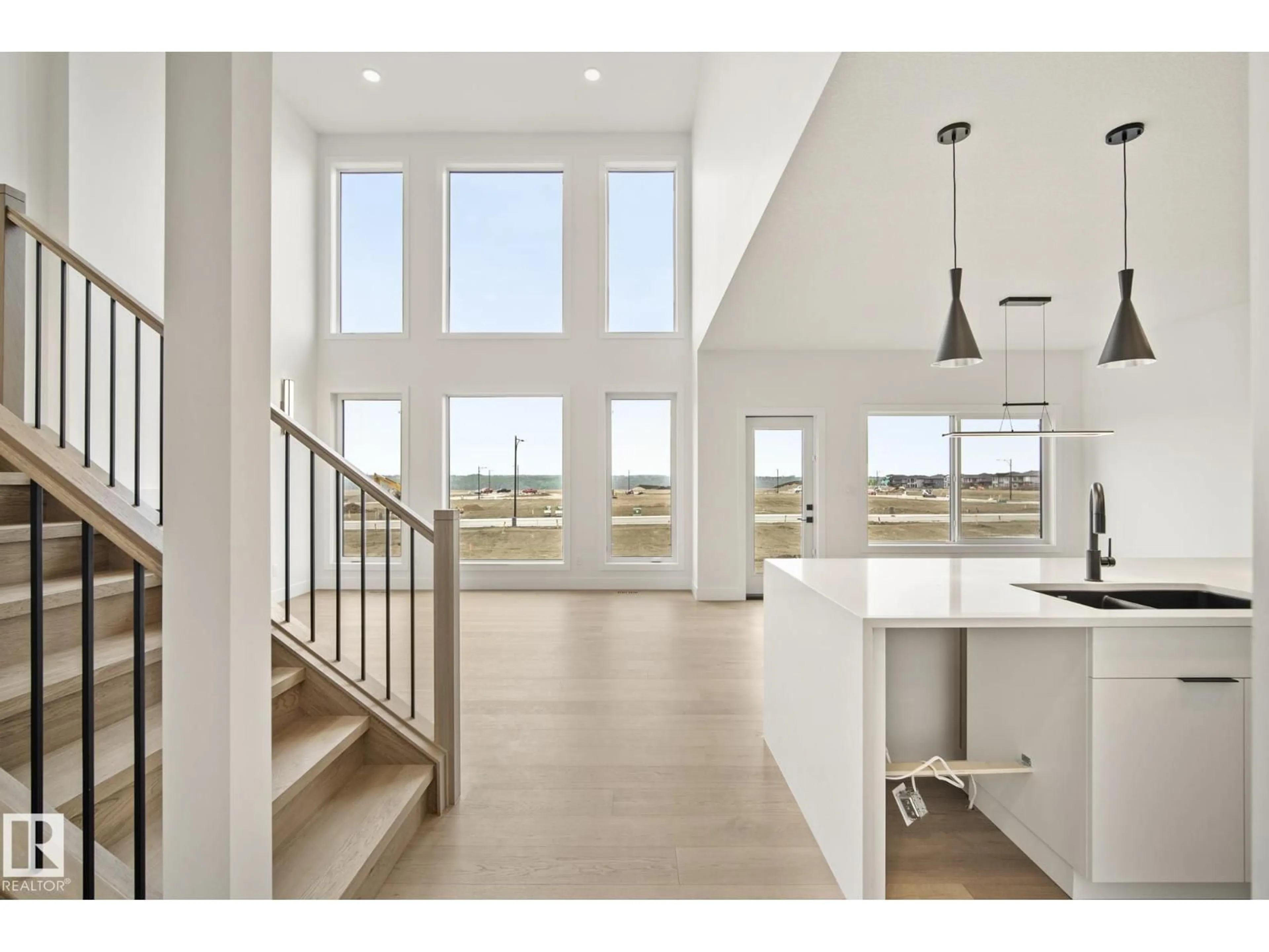 Open concept kitchen, unknown for 7095 KIVIAQ CR, Edmonton Alberta T6W5N7