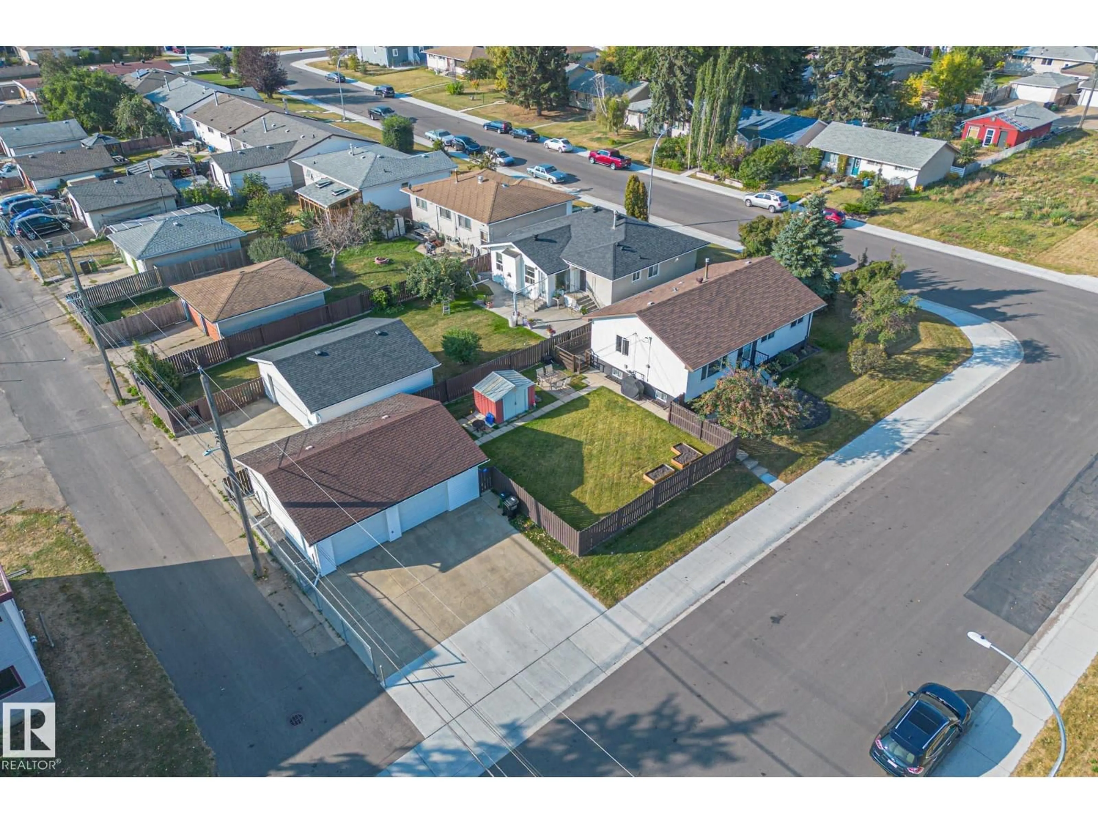 A pic from outside/outdoor area/front of a property/back of a property/a pic from drone, street for 8515 131 AV, Edmonton Alberta T5E5S3