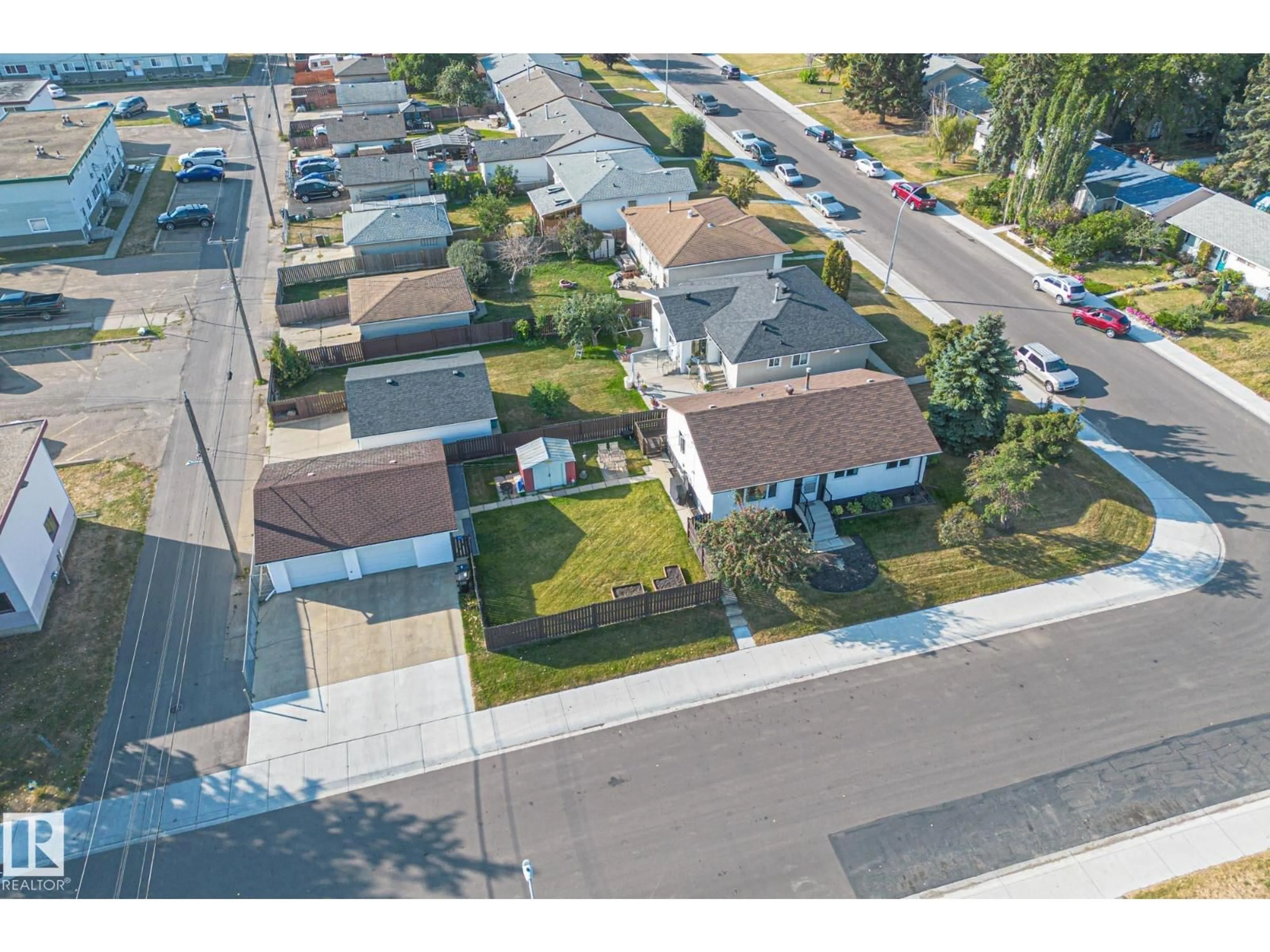 A pic from outside/outdoor area/front of a property/back of a property/a pic from drone, street for 8515 131 AV, Edmonton Alberta T5E5S3