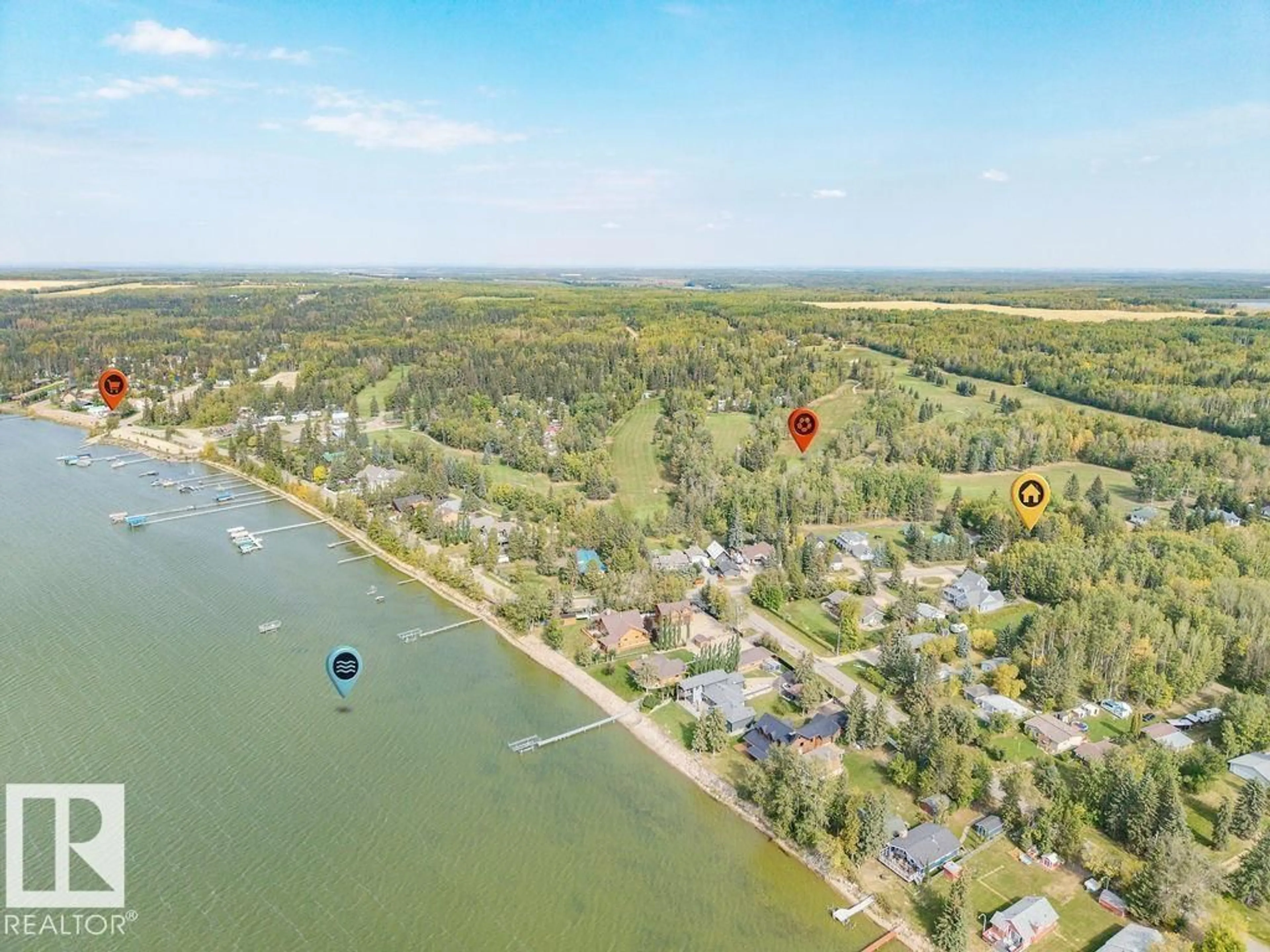 A pic from outside/outdoor area/front of a property/back of a property/a pic from drone, water/lake/river/ocean view for 4472 50 AV, Rural Wetaskiwin County Alberta T0C2C0