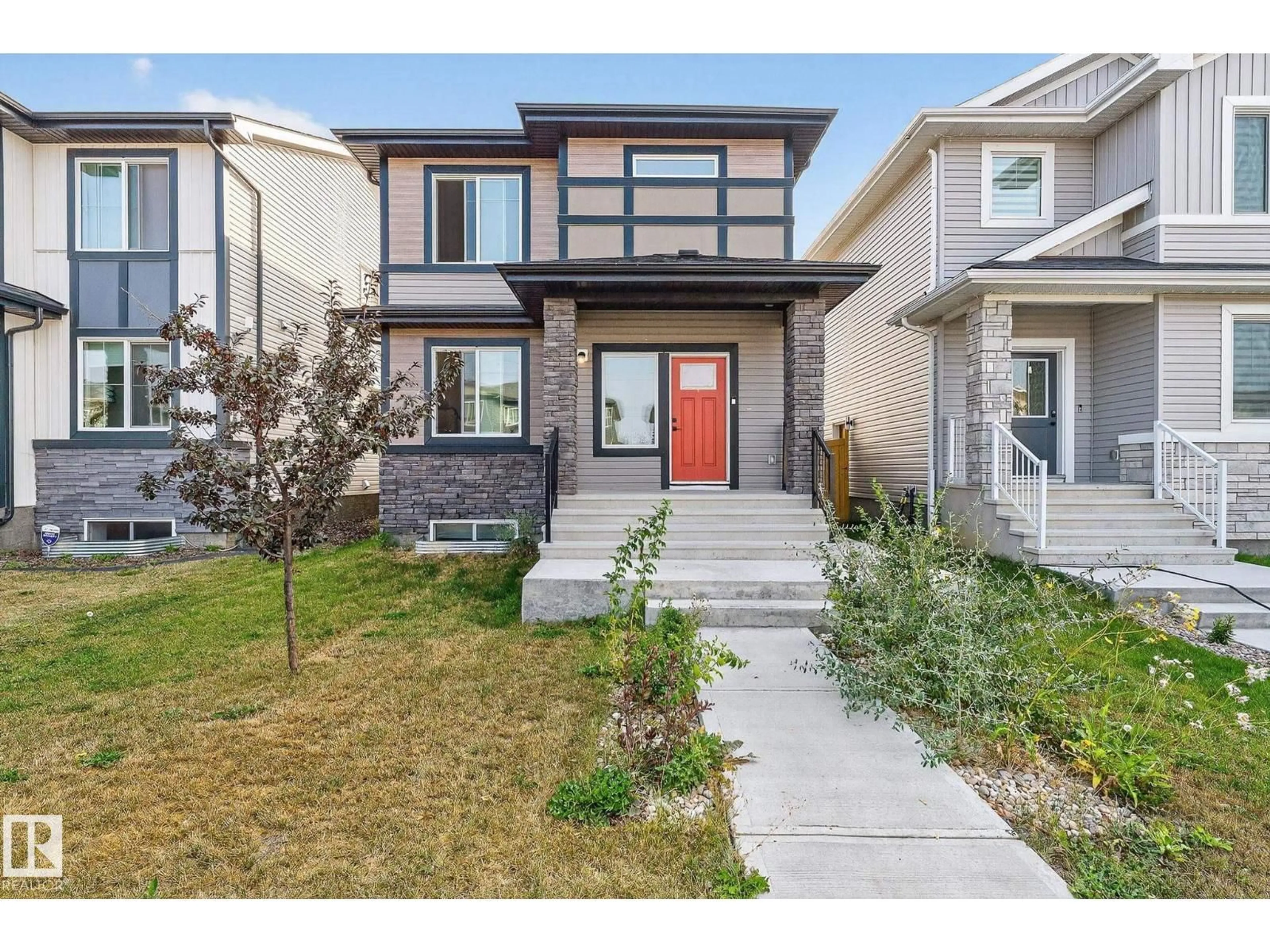 Home with vinyl exterior material, street for 49 WILTREE TC, Fort Saskatchewan Alberta T8L0X6