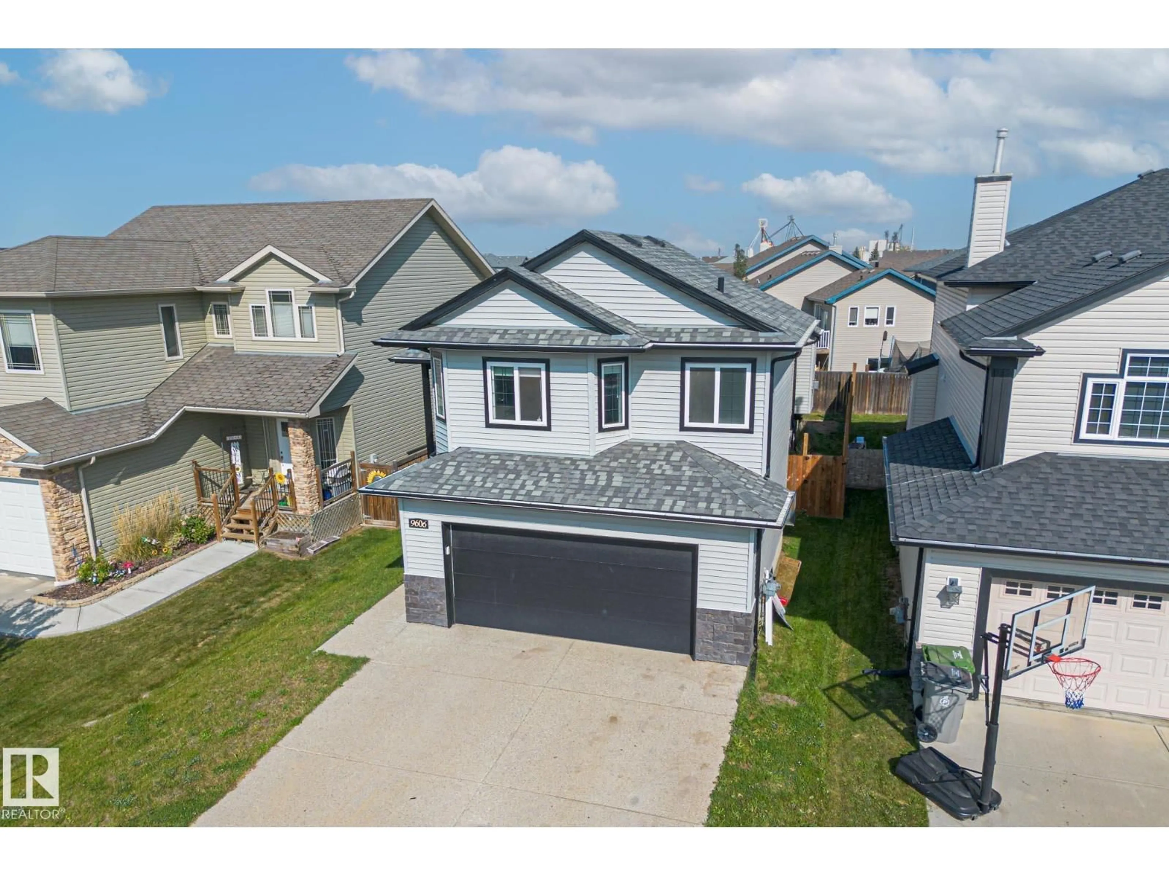 A pic from outside/outdoor area/front of a property/back of a property/a pic from drone, street for 9606 83 AV, Morinville Alberta T8R0A6
