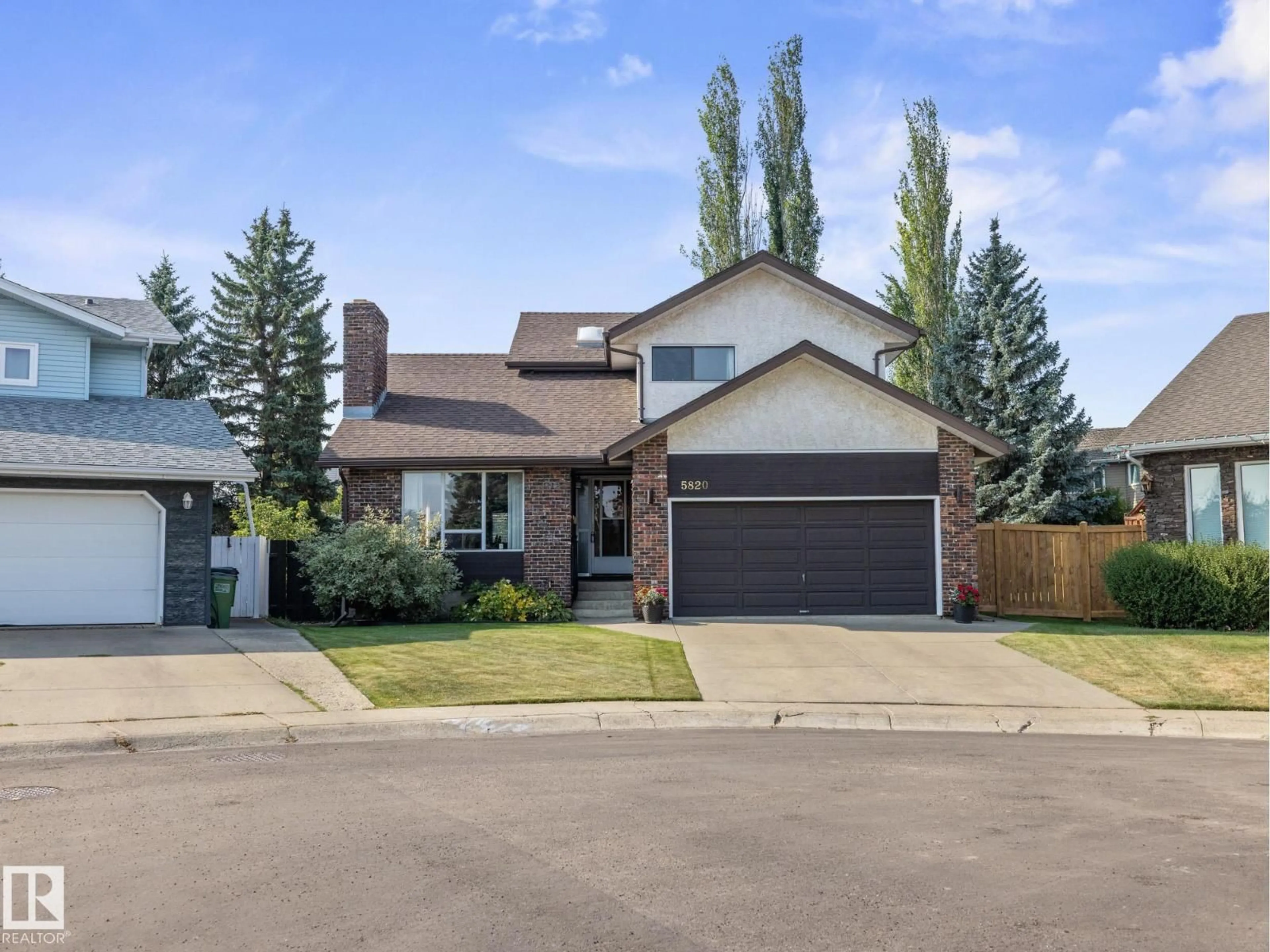Home with brick exterior material, street for 5820 181 ST, Edmonton Alberta T6M1V6