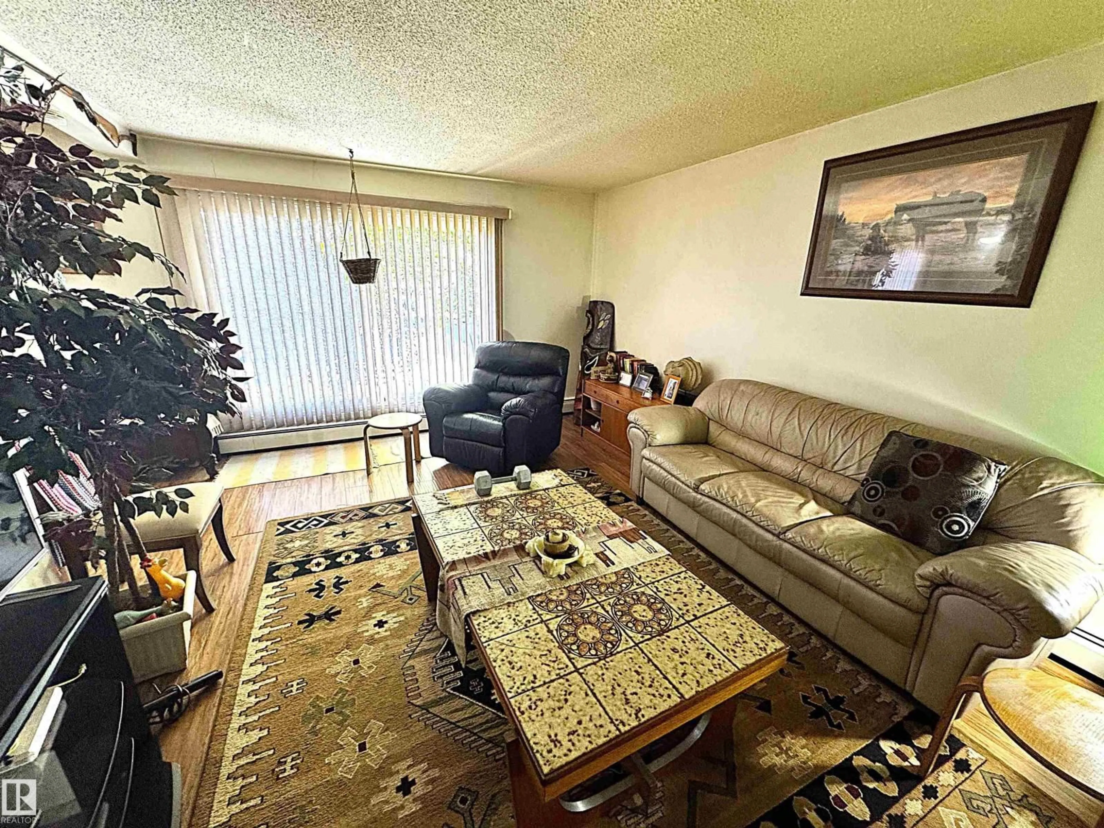 Living room with furniture, unknown for #201 - 10035 164 ST, Edmonton Alberta T5P4L4