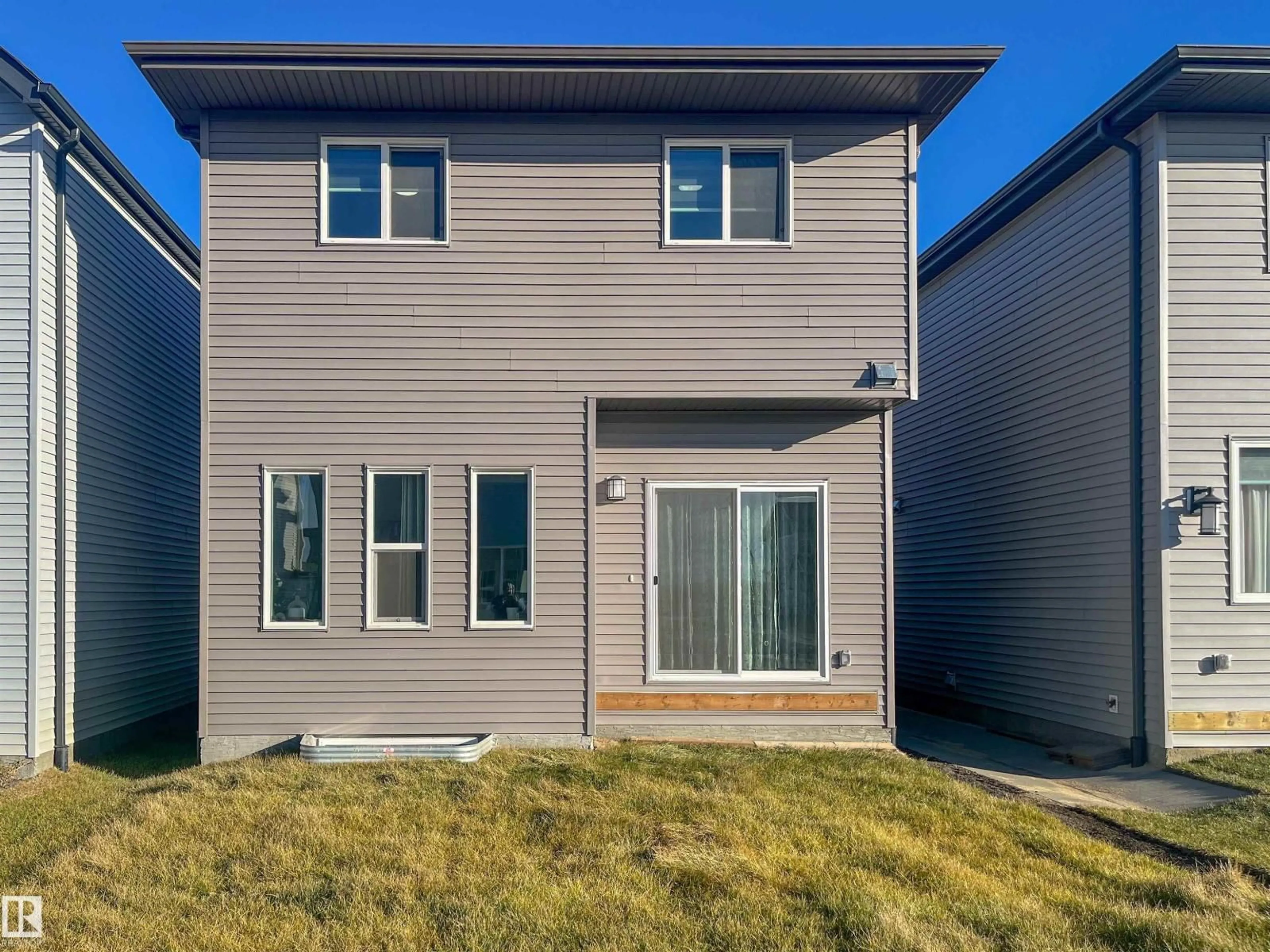 Home with vinyl exterior material, street for NW - 2508 193 ST, Edmonton Alberta T6M1L3