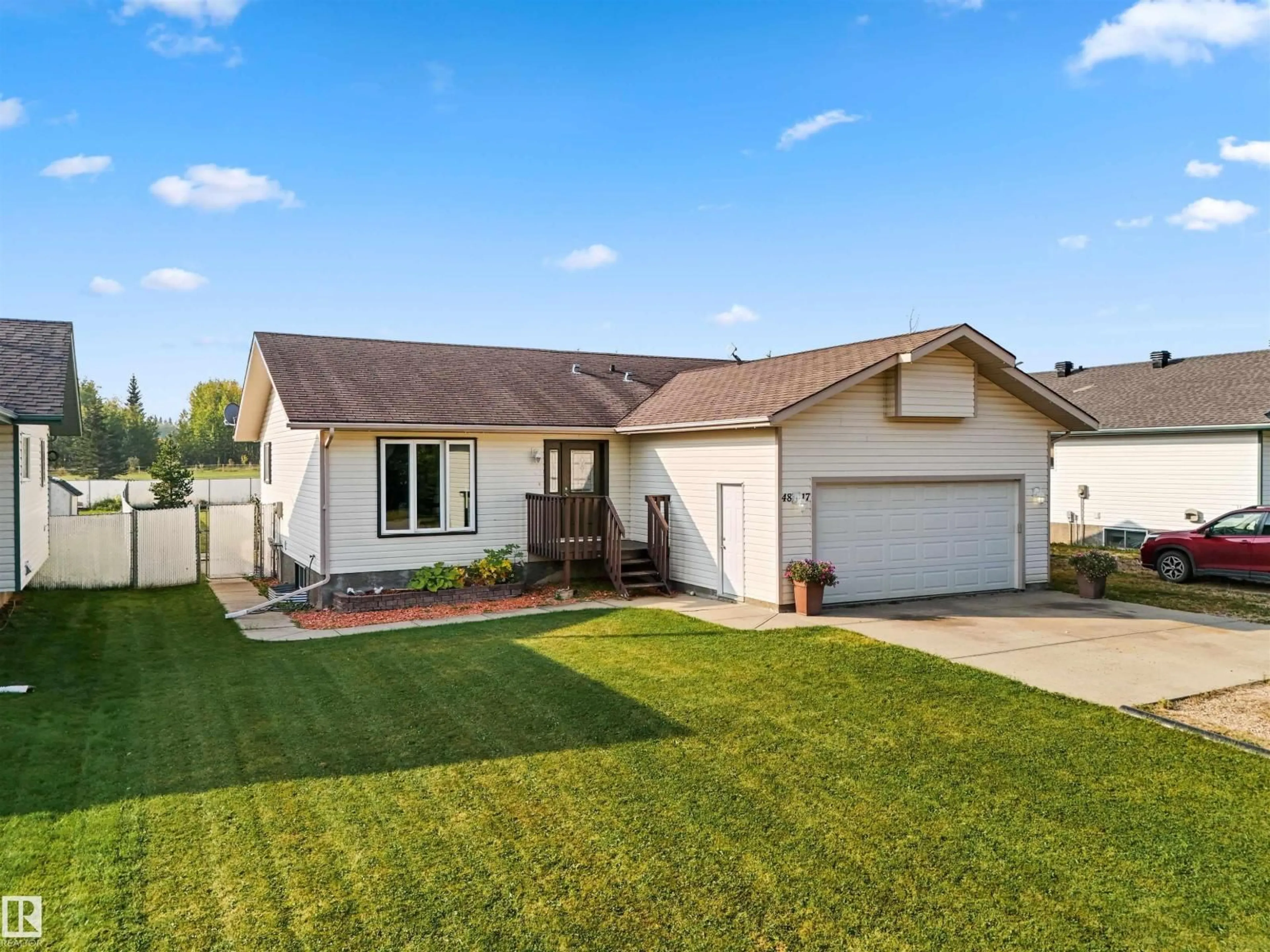 Home with vinyl exterior material, street for 4817 48 AV, Rocky Rapids Alberta T0E1Z0