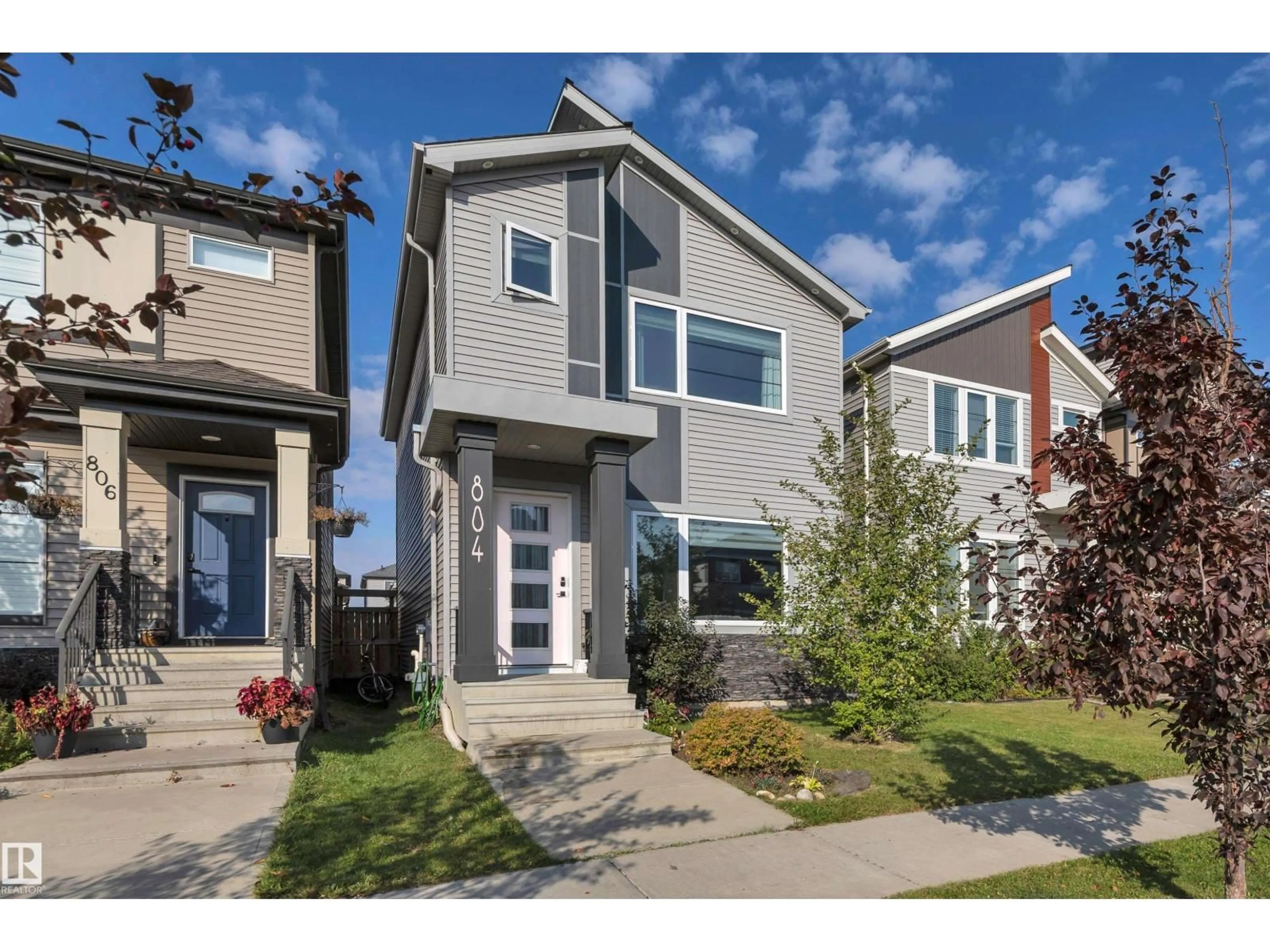 Home with vinyl exterior material, street for 804 BERG LO, Leduc Alberta T9E1G9