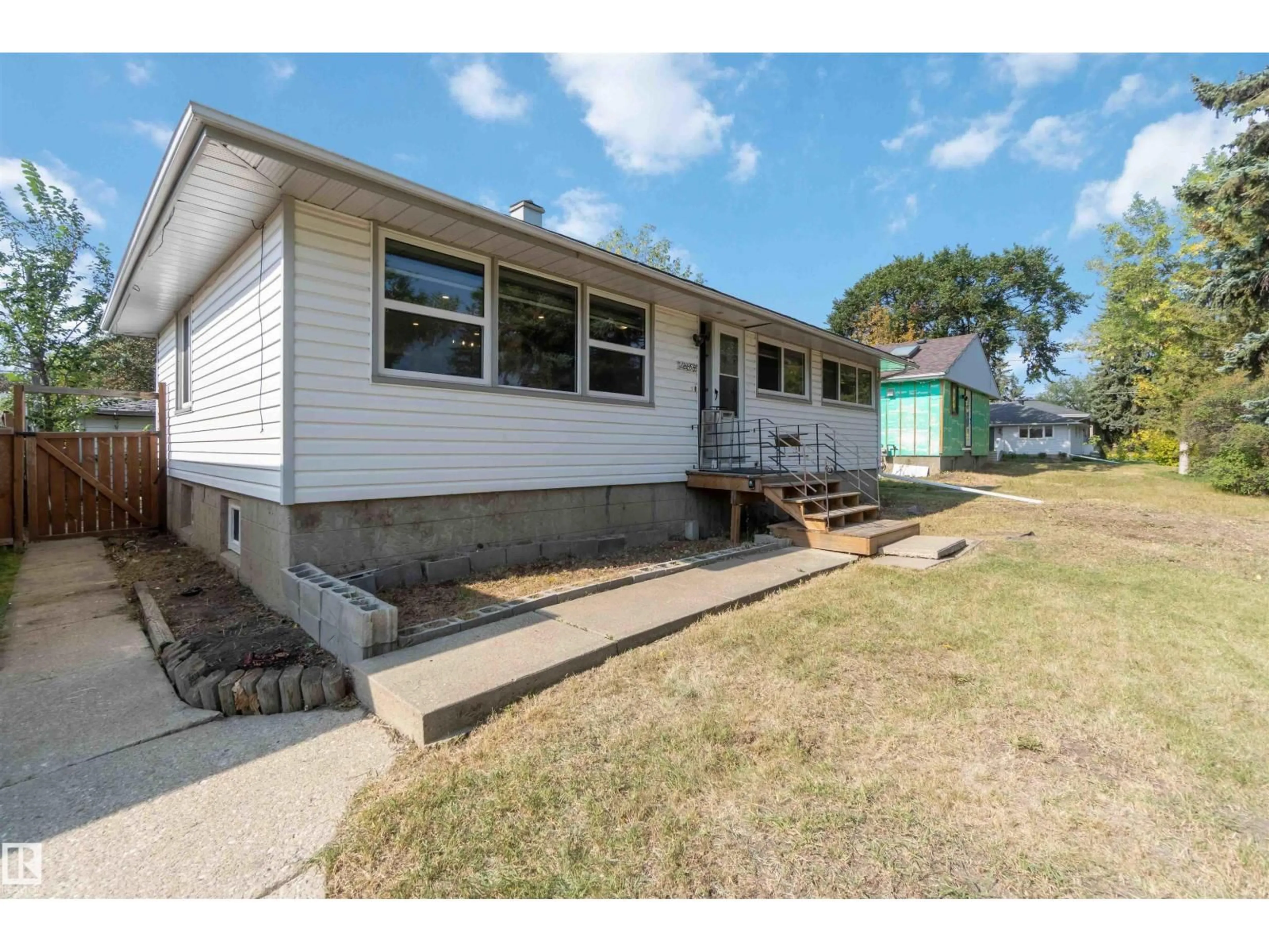 Home with vinyl exterior material, street for NW - 12268 131 ST, Edmonton Alberta T5L1M9