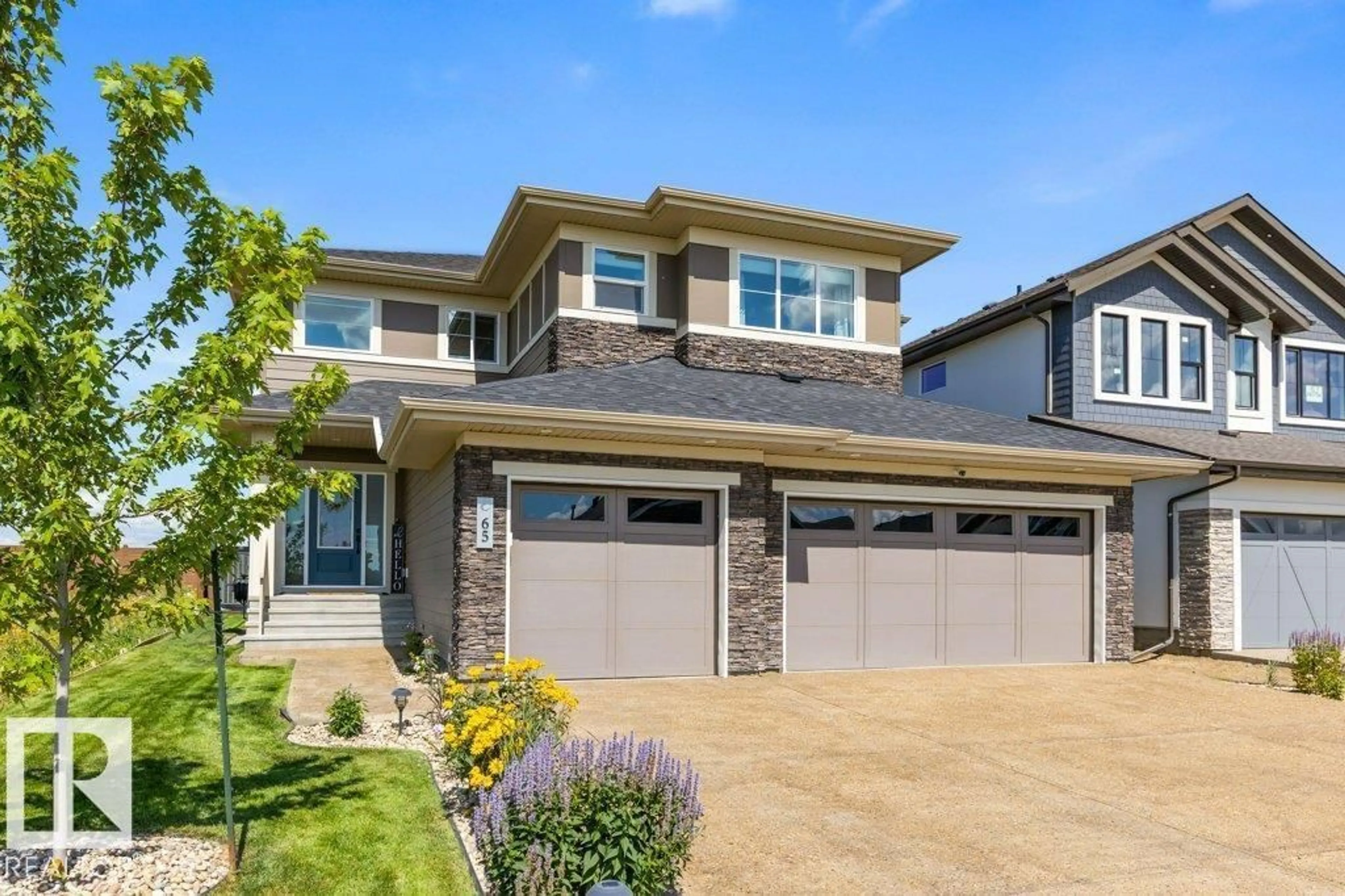 Home with vinyl exterior material, street for 65 JUBILATION DR, St. Albert Alberta T8N7W7