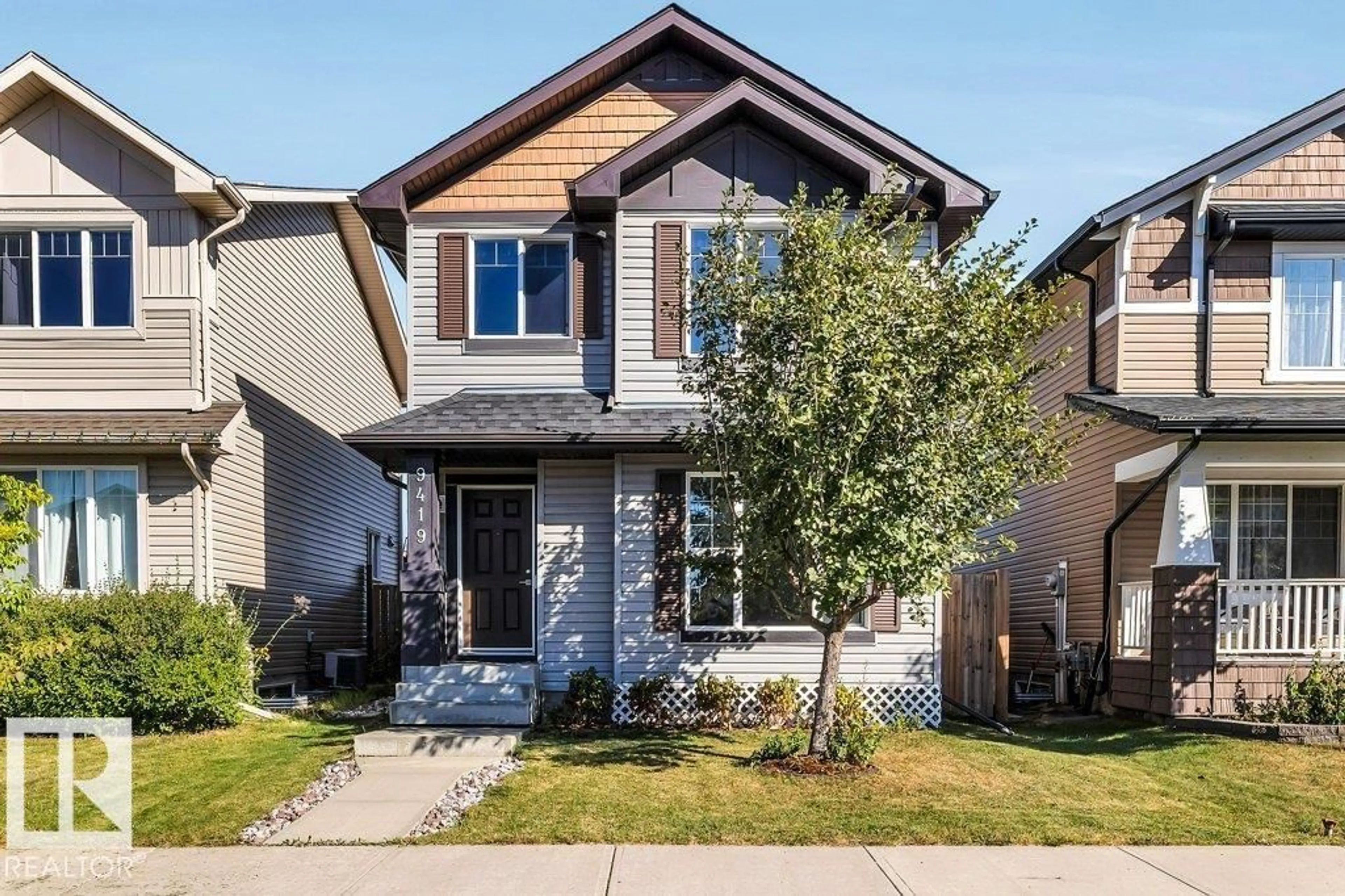 Home with brick exterior material, street for 9419 212 ST, Edmonton Alberta T5T4R3