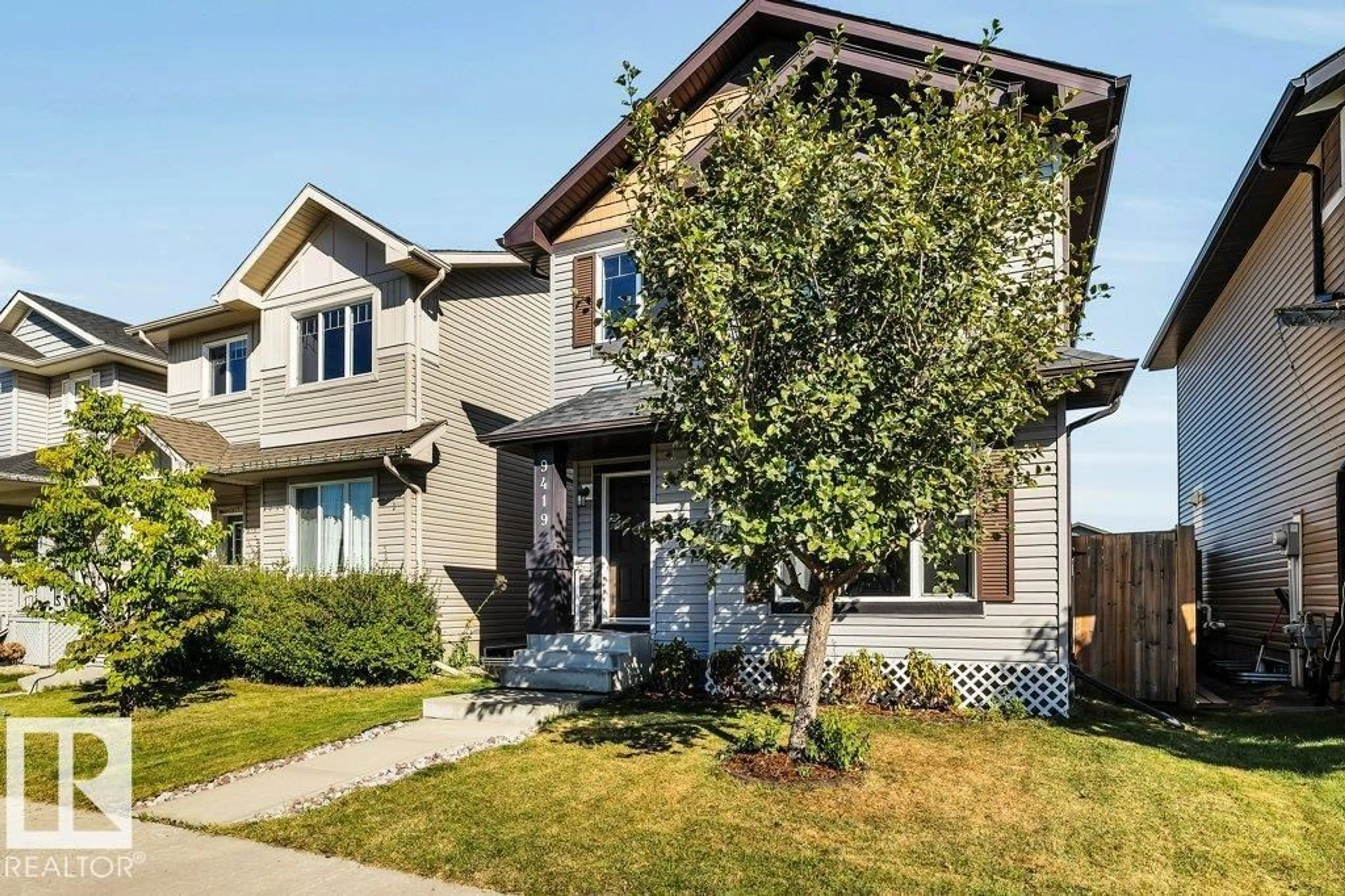 Home with brick exterior material, street for 9419 212 ST, Edmonton Alberta T5T4R3
