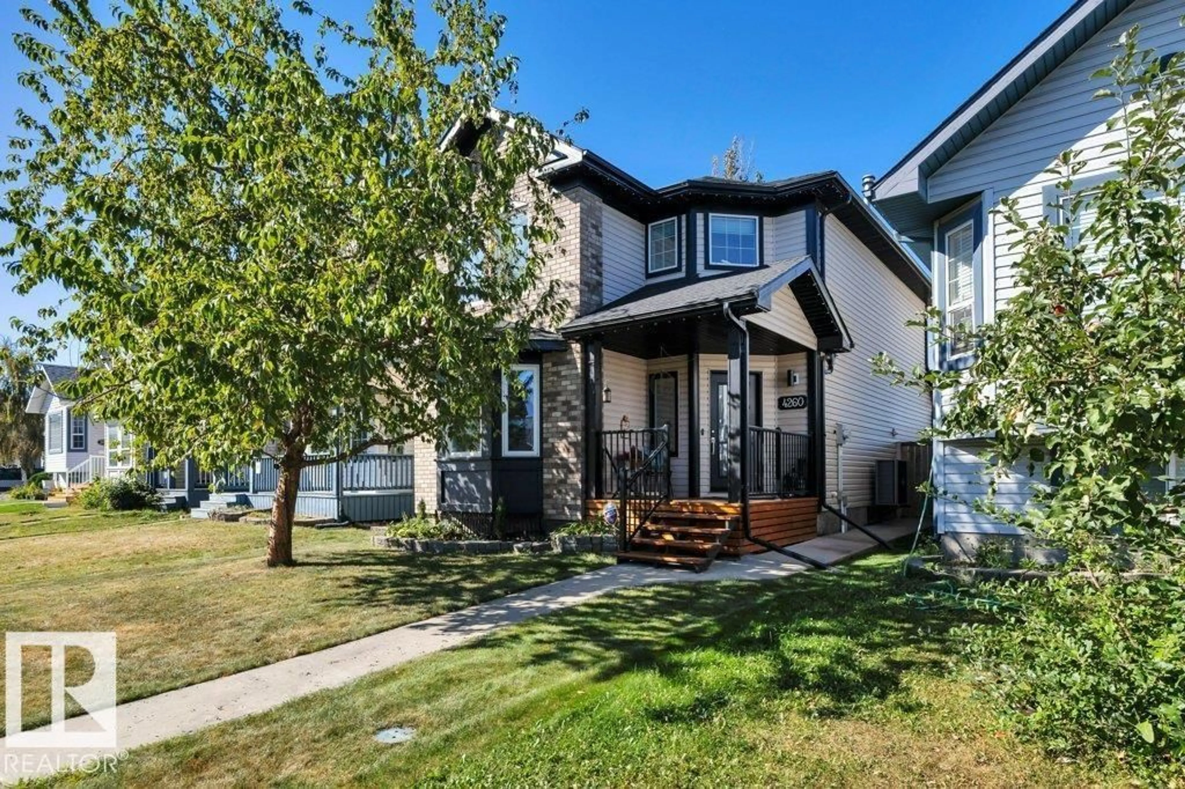 Home with vinyl exterior material, street for 4260 24 ST, Edmonton Alberta T6T1L9
