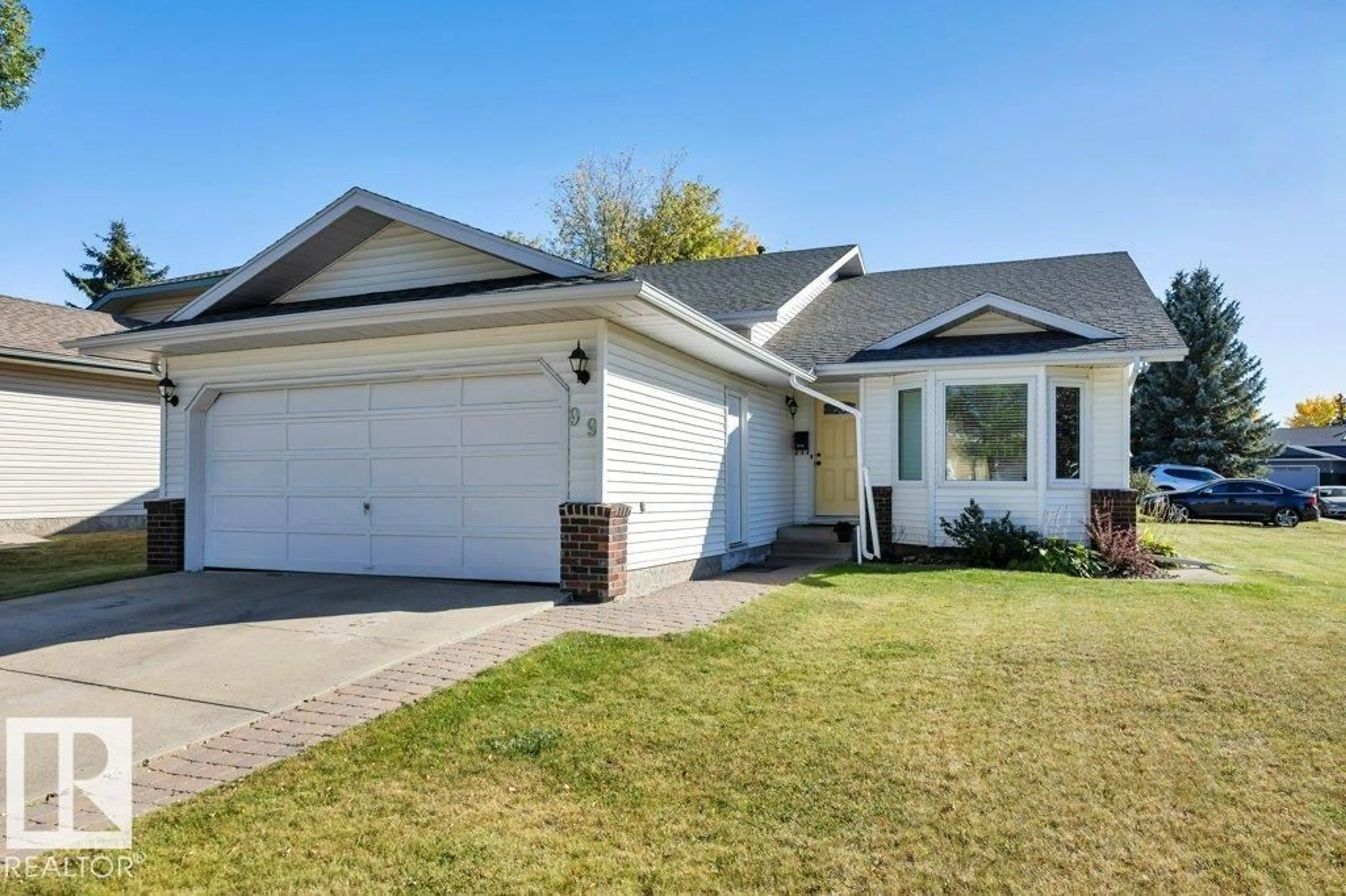 Home with vinyl exterior material, street for 99 MEADOWVIEW DR, Leduc Alberta T9E6Y1