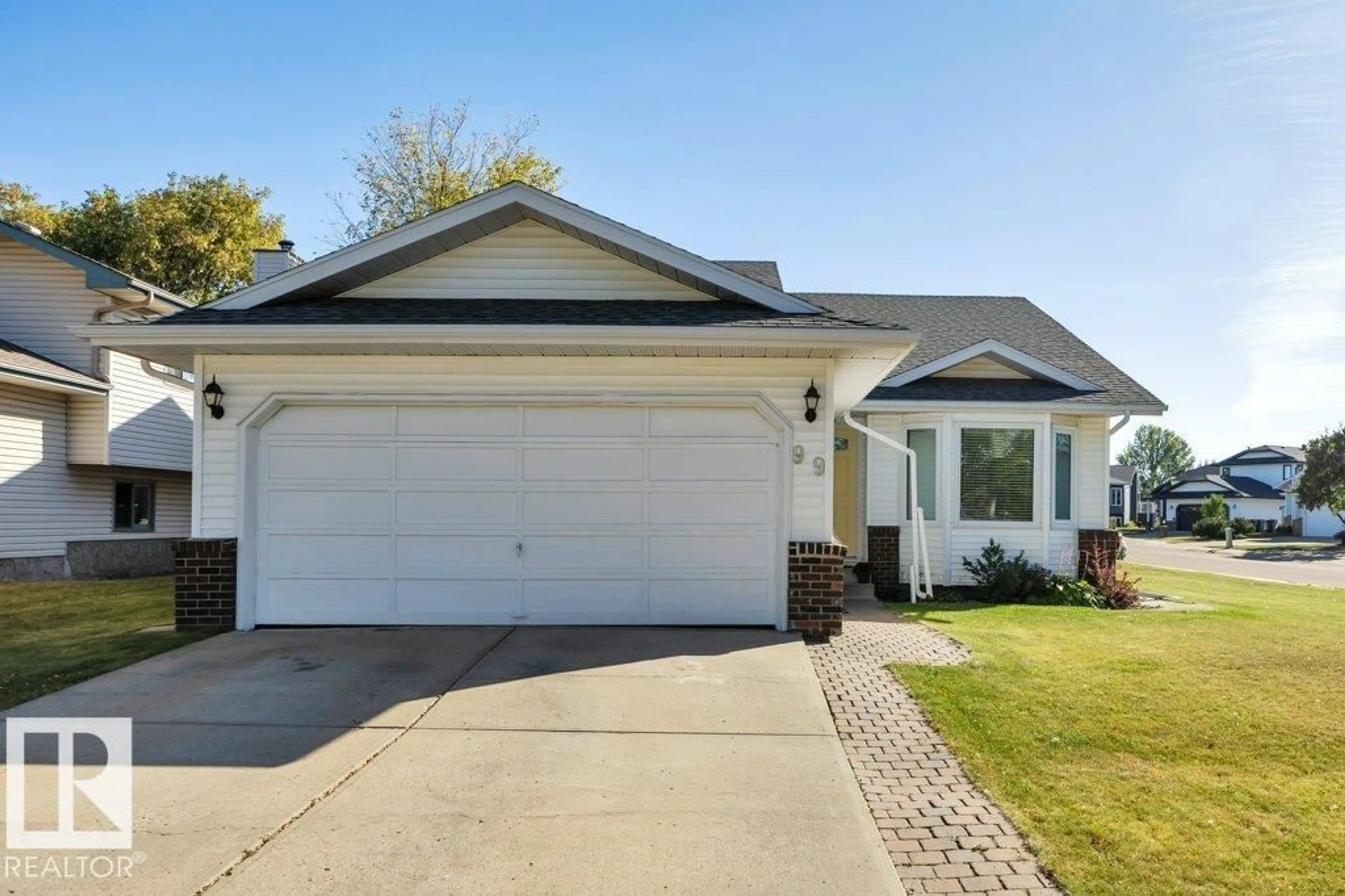 Home with vinyl exterior material, street for 99 MEADOWVIEW DR, Leduc Alberta T9E6Y1