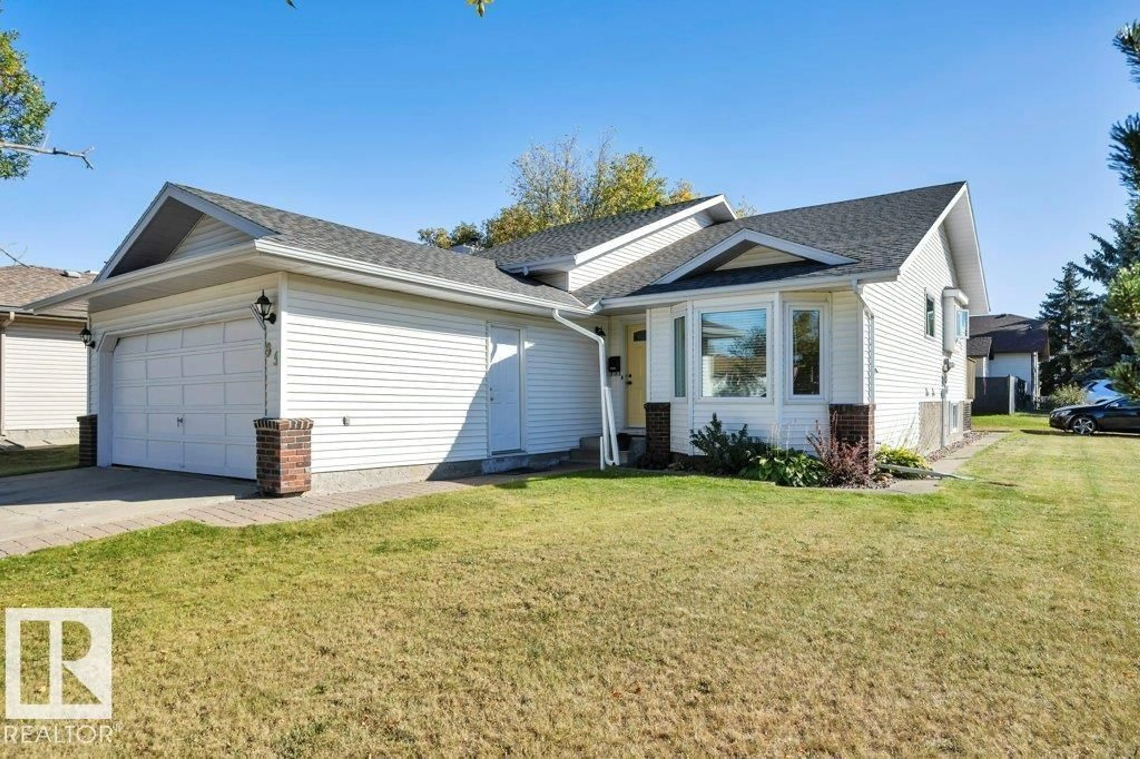 Home with vinyl exterior material, street for 99 MEADOWVIEW DR, Leduc Alberta T9E6Y1