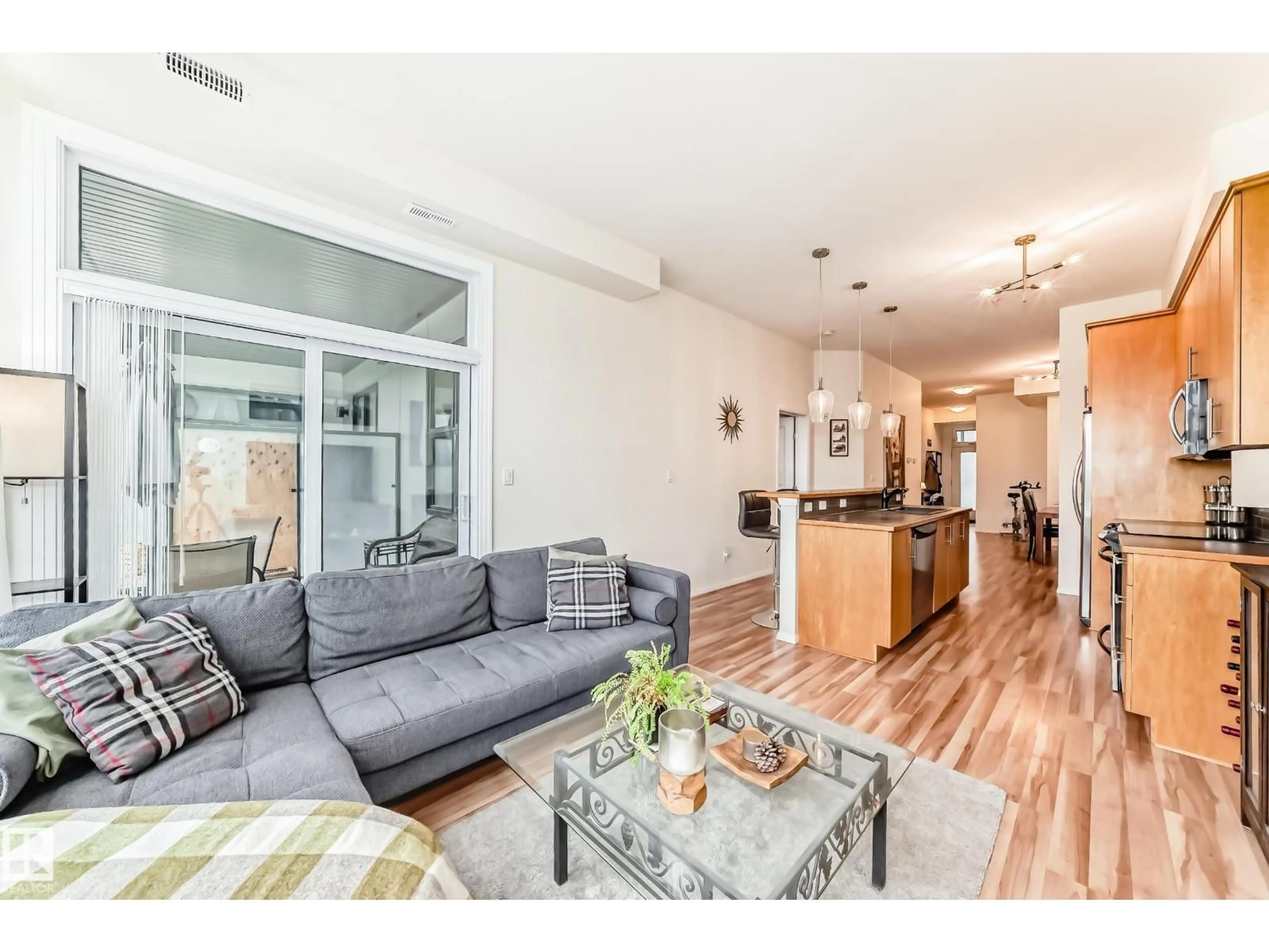 Open concept kitchen, wood/laminate floor for #303 - 10531 117 ST, Edmonton Alberta T5H0A8