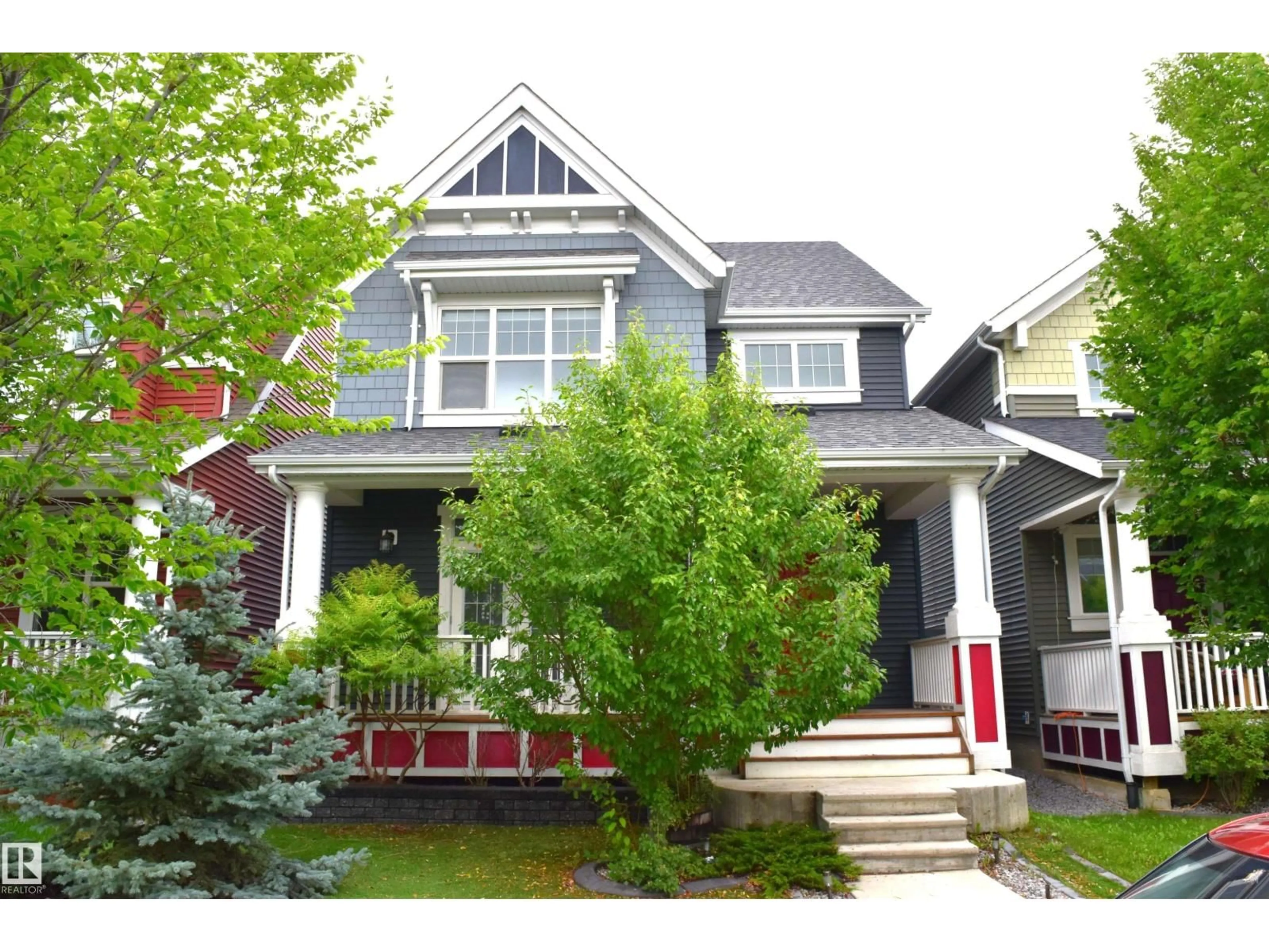 Home with vinyl exterior material, street for 7108 SUMMERSIDE GRANDE BV, Edmonton Alberta T6X2E7