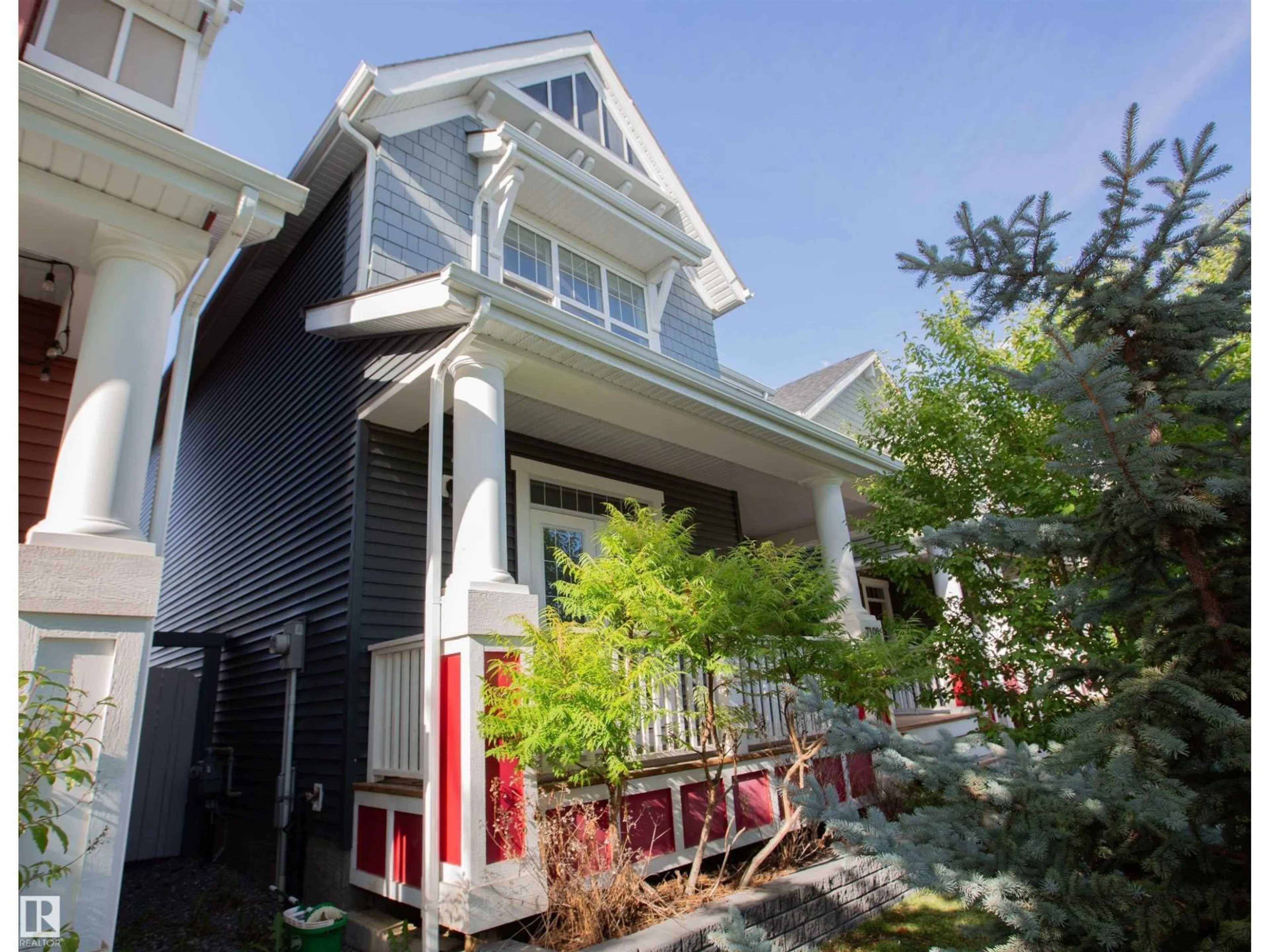 Home with vinyl exterior material, street for 7108 SUMMERSIDE GRANDE BV, Edmonton Alberta T6X2E7