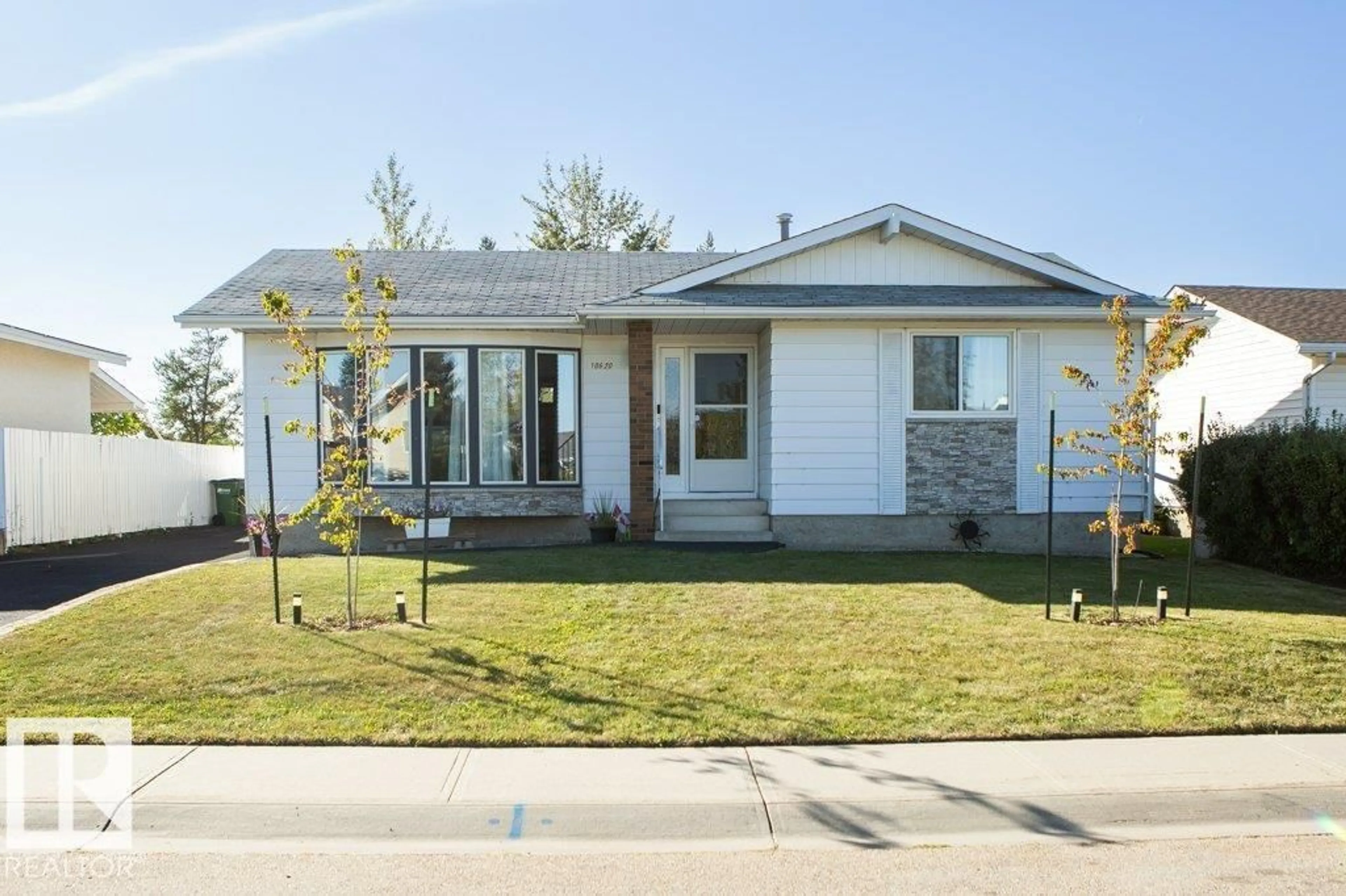 Home with vinyl exterior material, street for 10620 106A AV, Westlock Alberta T7P1B4