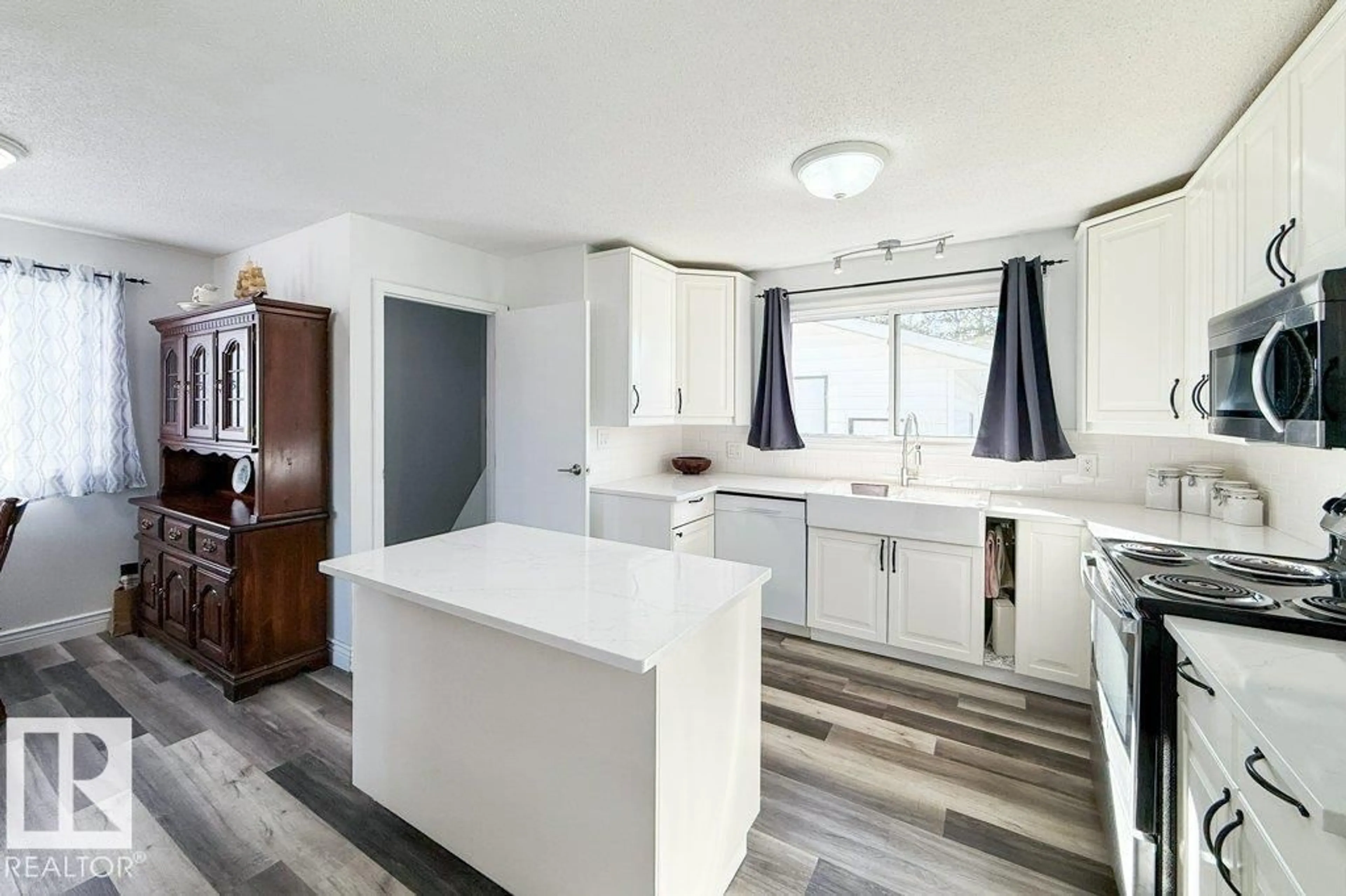 Open concept kitchen, unknown for 10620 106A AV, Westlock Alberta T7P1B4