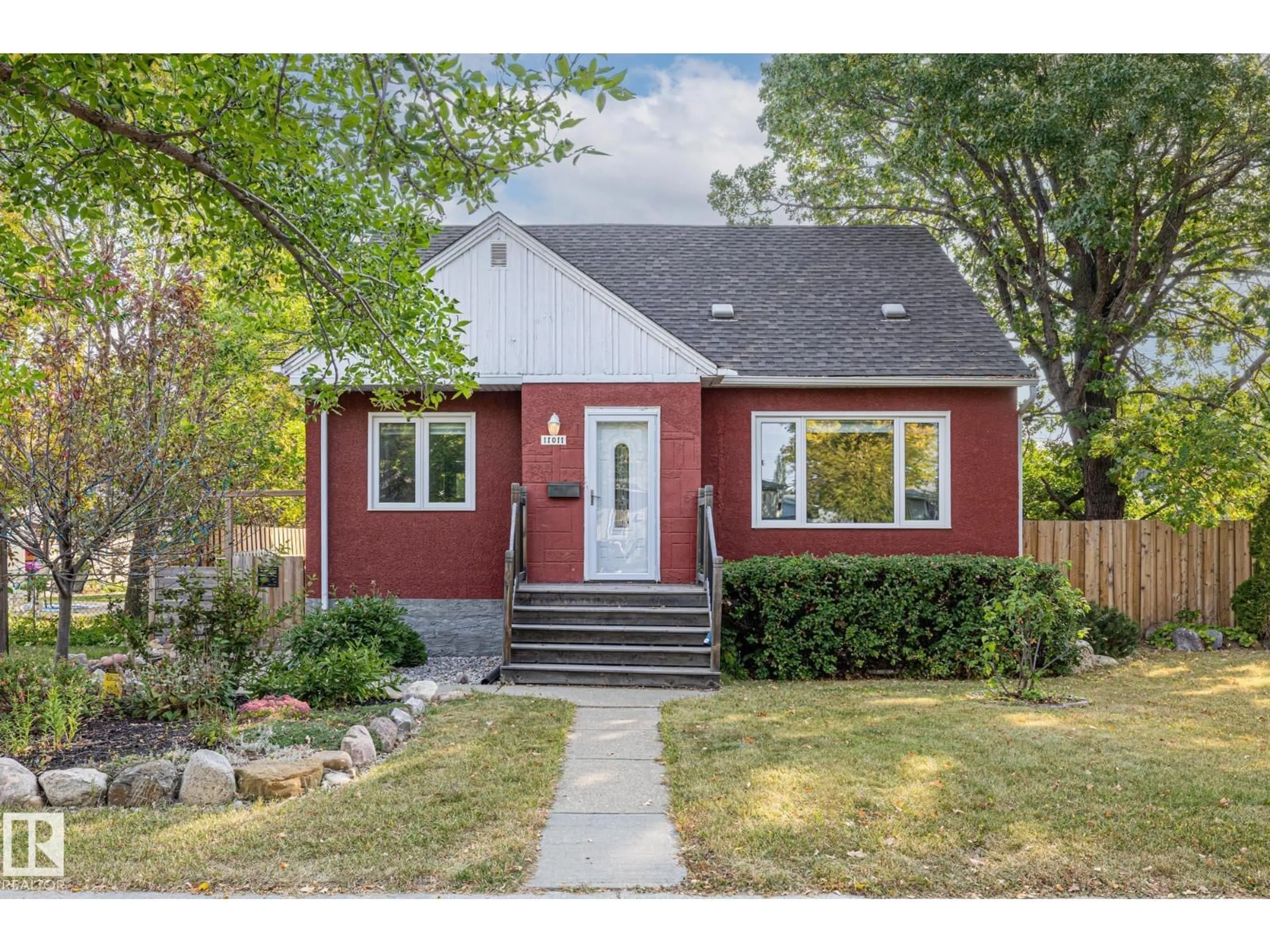 Home with brick exterior material, street for NW - 11011 135 ST, Edmonton Alberta T5M1K4