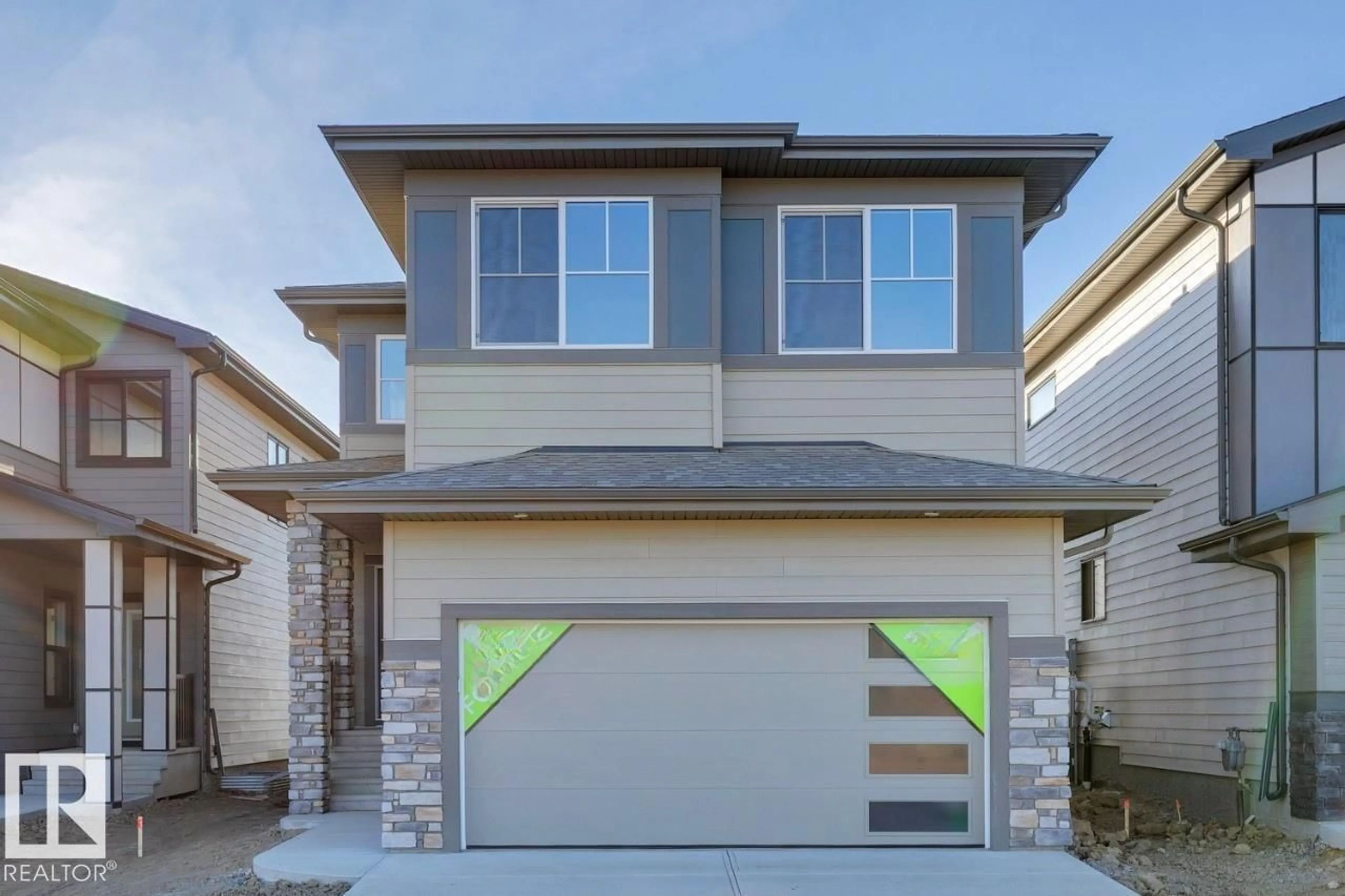 Home with vinyl exterior material, street for 7608 KIMIWAN CR, Edmonton Alberta T6W5N6