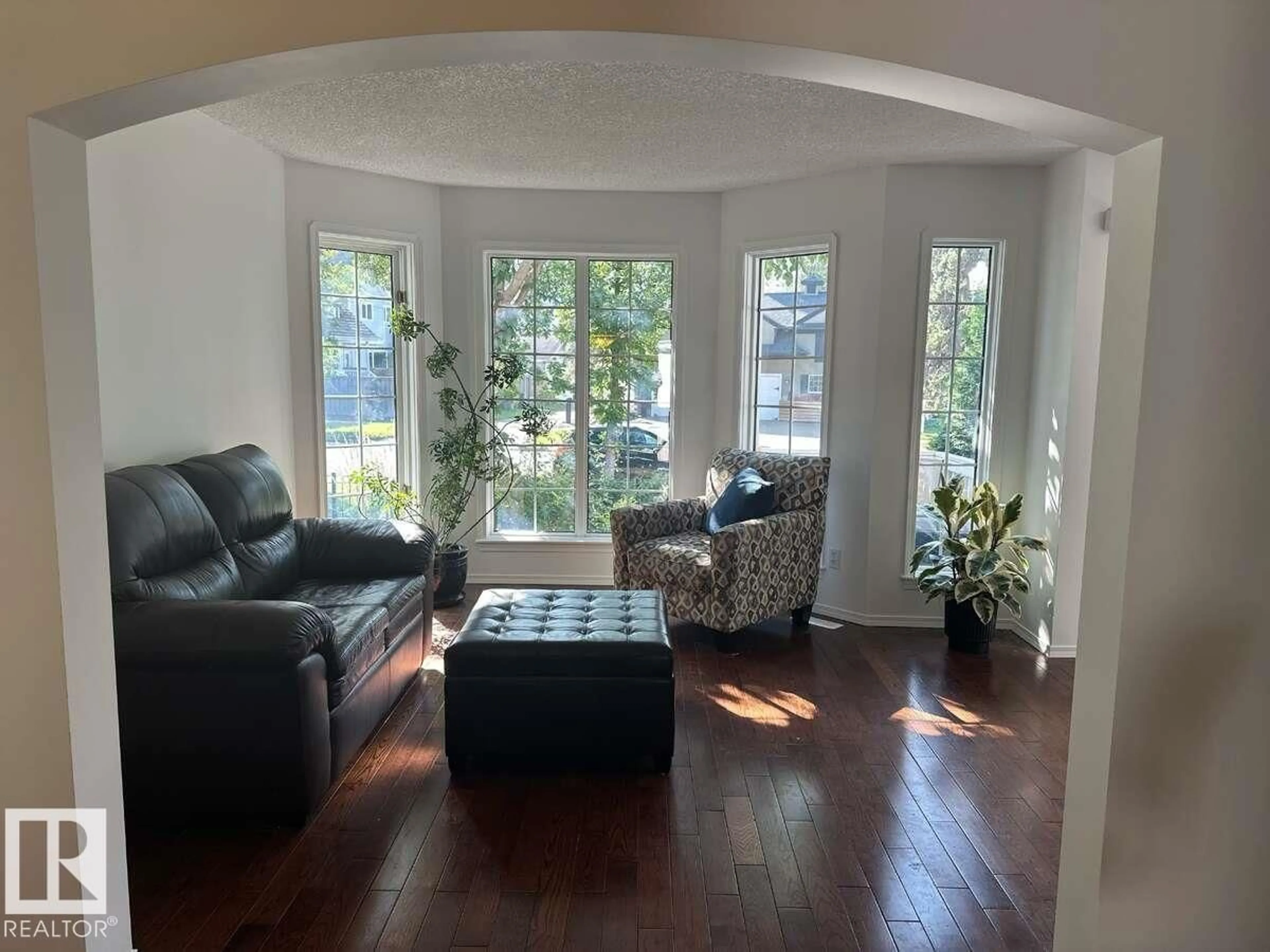 Living room with furniture, unknown for 10020 97 AV, Edmonton Alberta T5K0B1