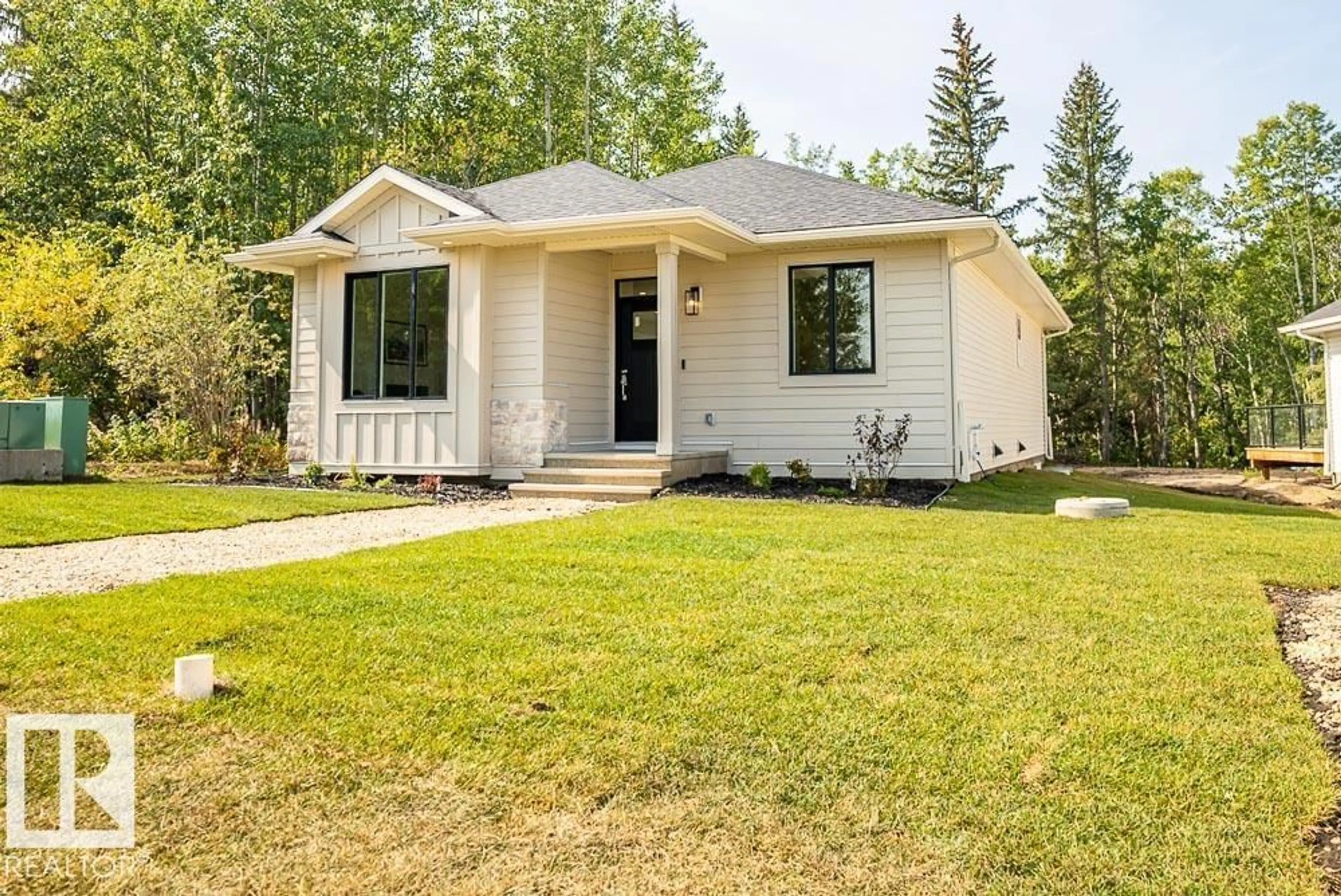 Home with vinyl exterior material, street for 112 HERON POINT CL, Rural Wetaskiwin County Alberta T0C2V0