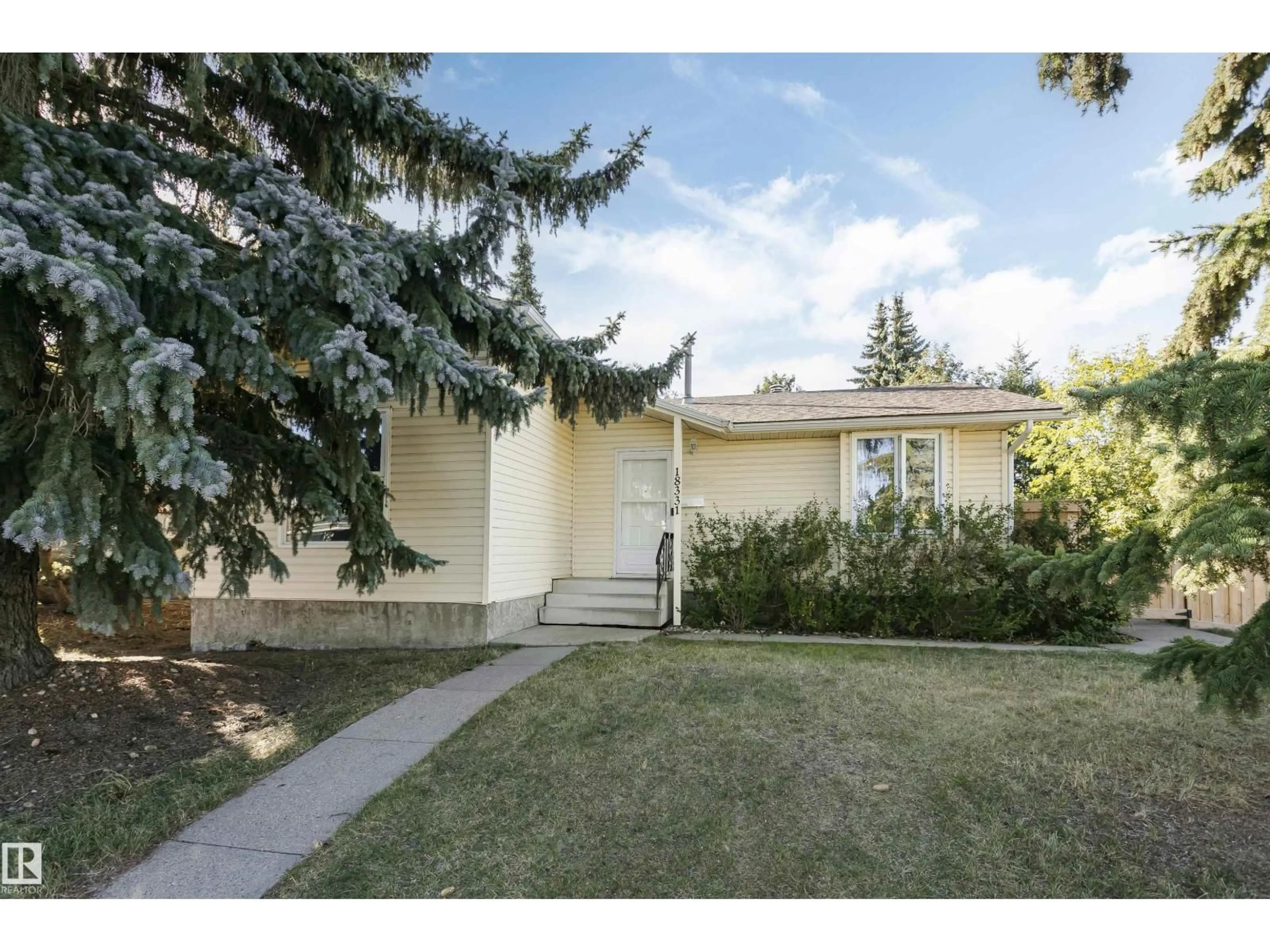 Home with vinyl exterior material, street for NW - 18331 68 AV, Edmonton Alberta T5T2H5