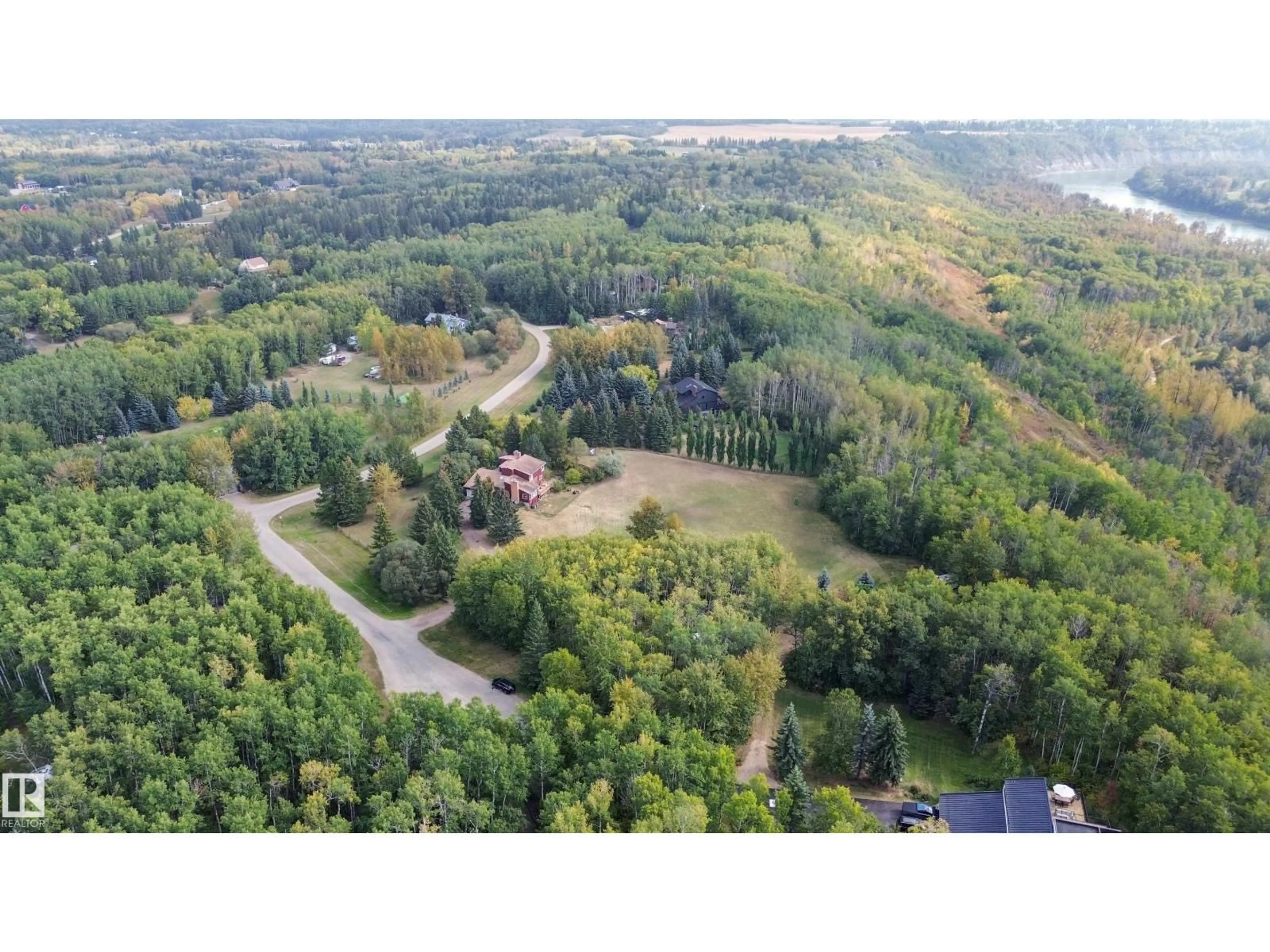 A pic from outside/outdoor area/front of a property/back of a property/a pic from drone, forest/trees view for 26123 - 29 TWP RD 511 RD, Rural Parkland County Alberta T7Y1B9