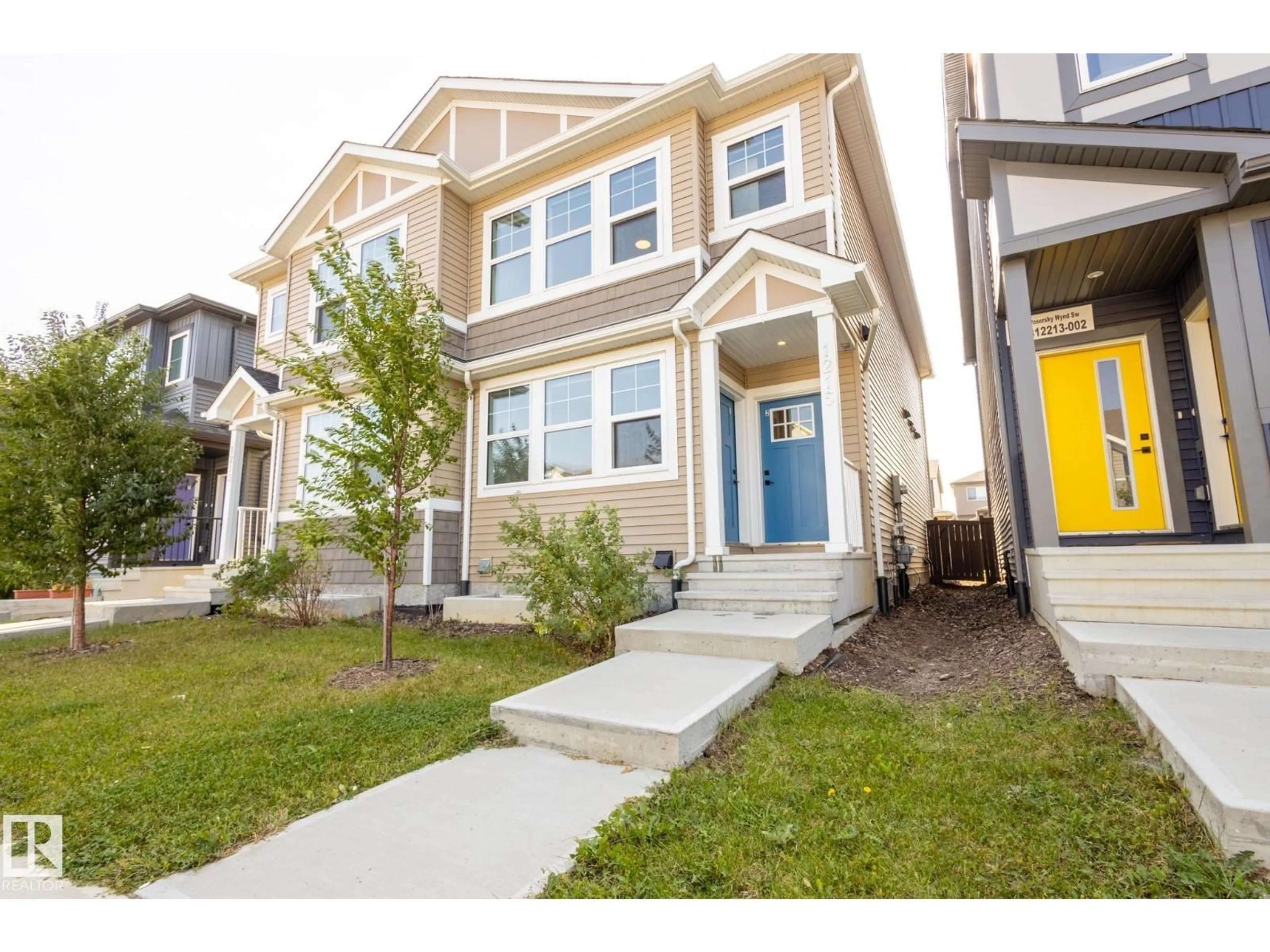 Home with vinyl exterior material, street for 1215 PODERSKY WD, Edmonton Alberta T6W4W3