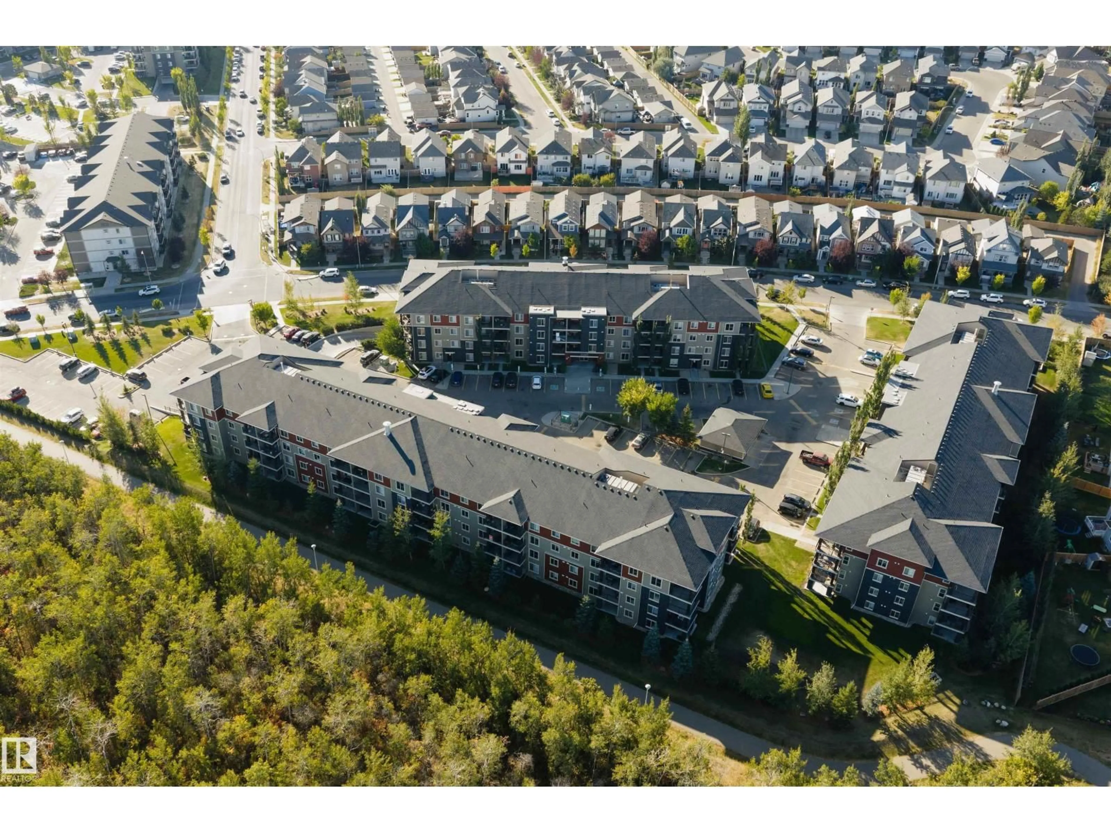 A pic from outside/outdoor area/front of a property/back of a property/a pic from drone, street for #402 - 1080 MCCONACHIE BLVD, Edmonton Alberta T5Y0X2