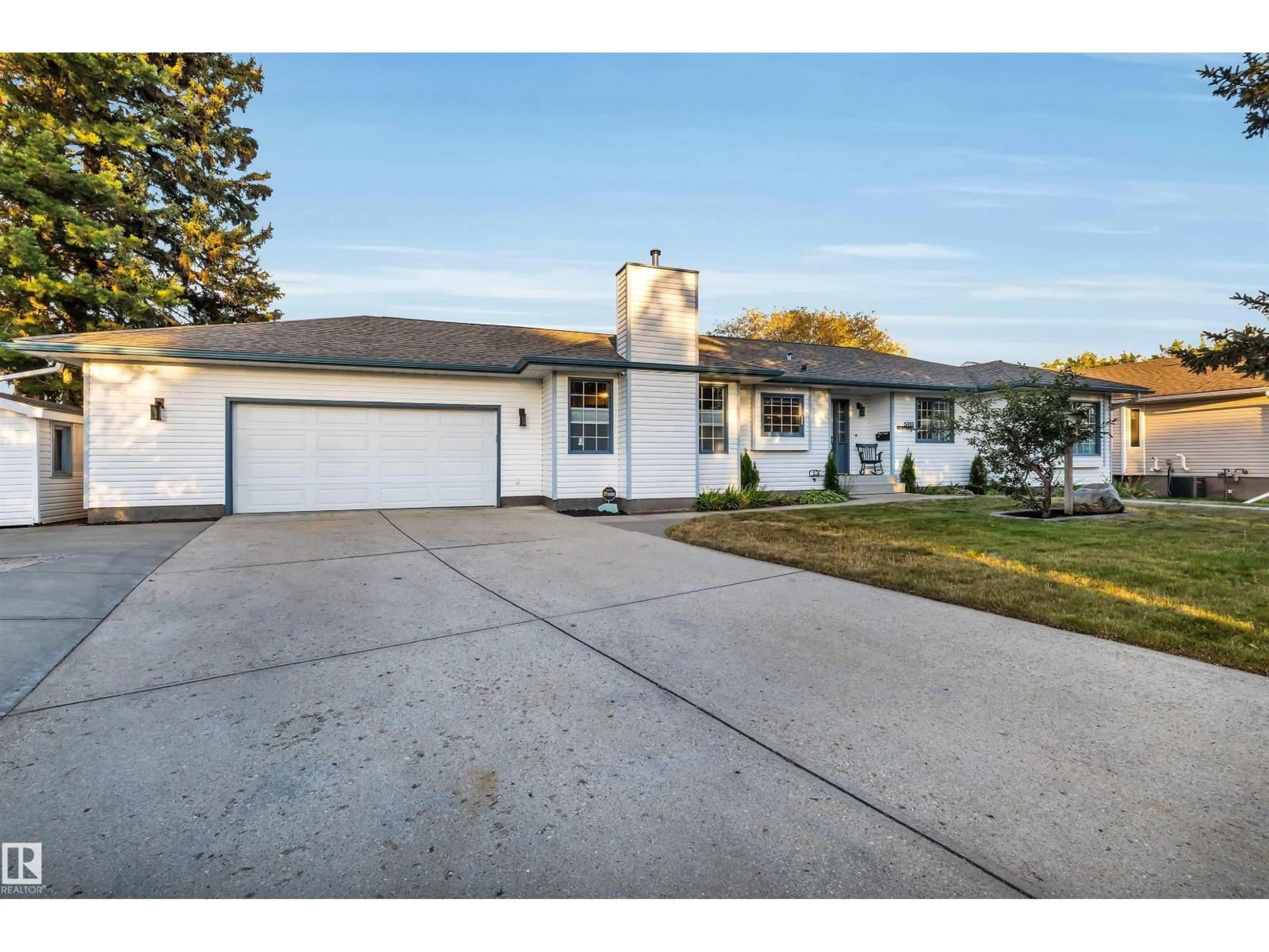 Home with vinyl exterior material, street for 5111 52 ST, Millet Alberta T0C1Z0