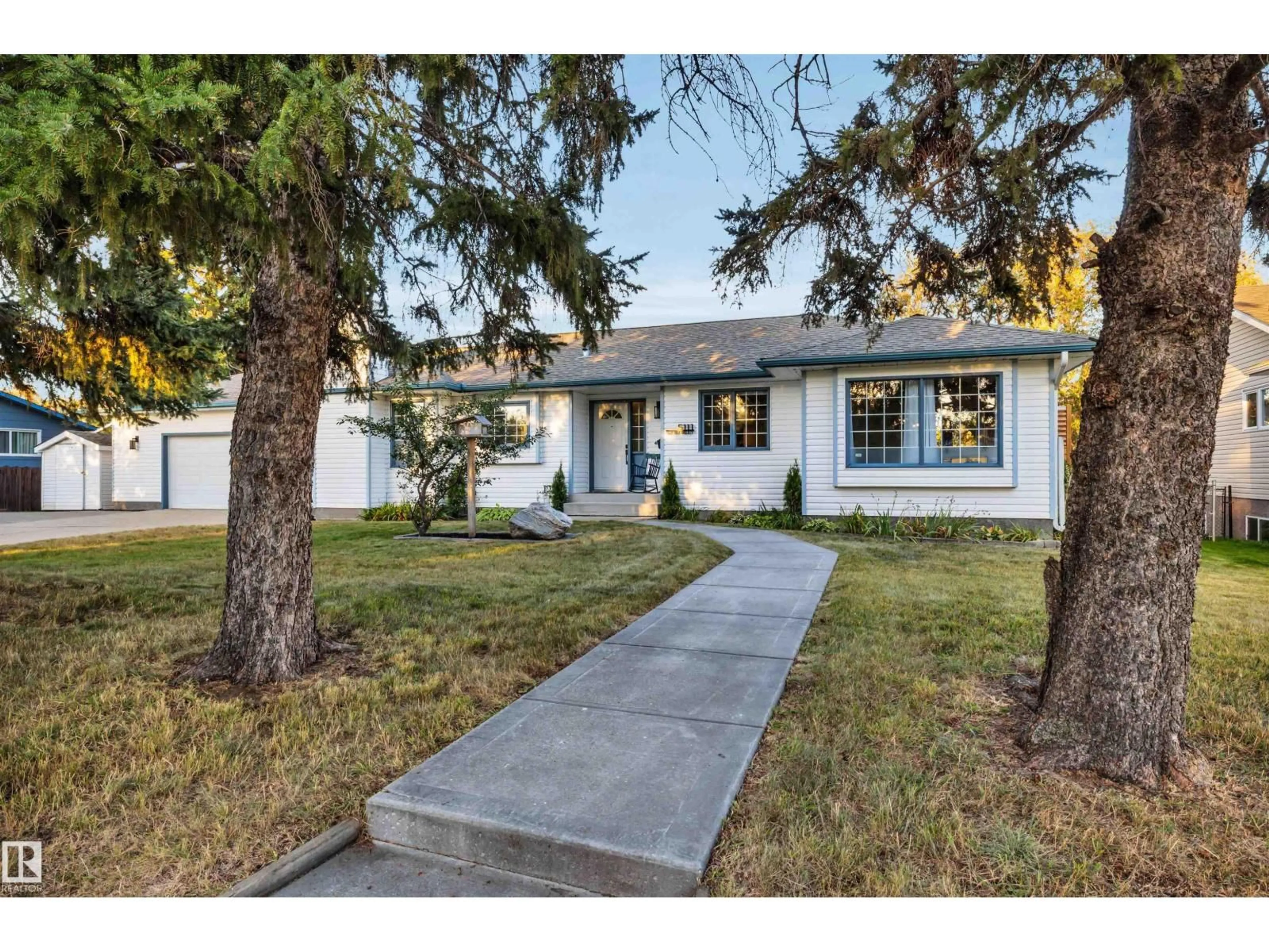 Home with vinyl exterior material, street for 5111 52 ST, Millet Alberta T0C1Z0